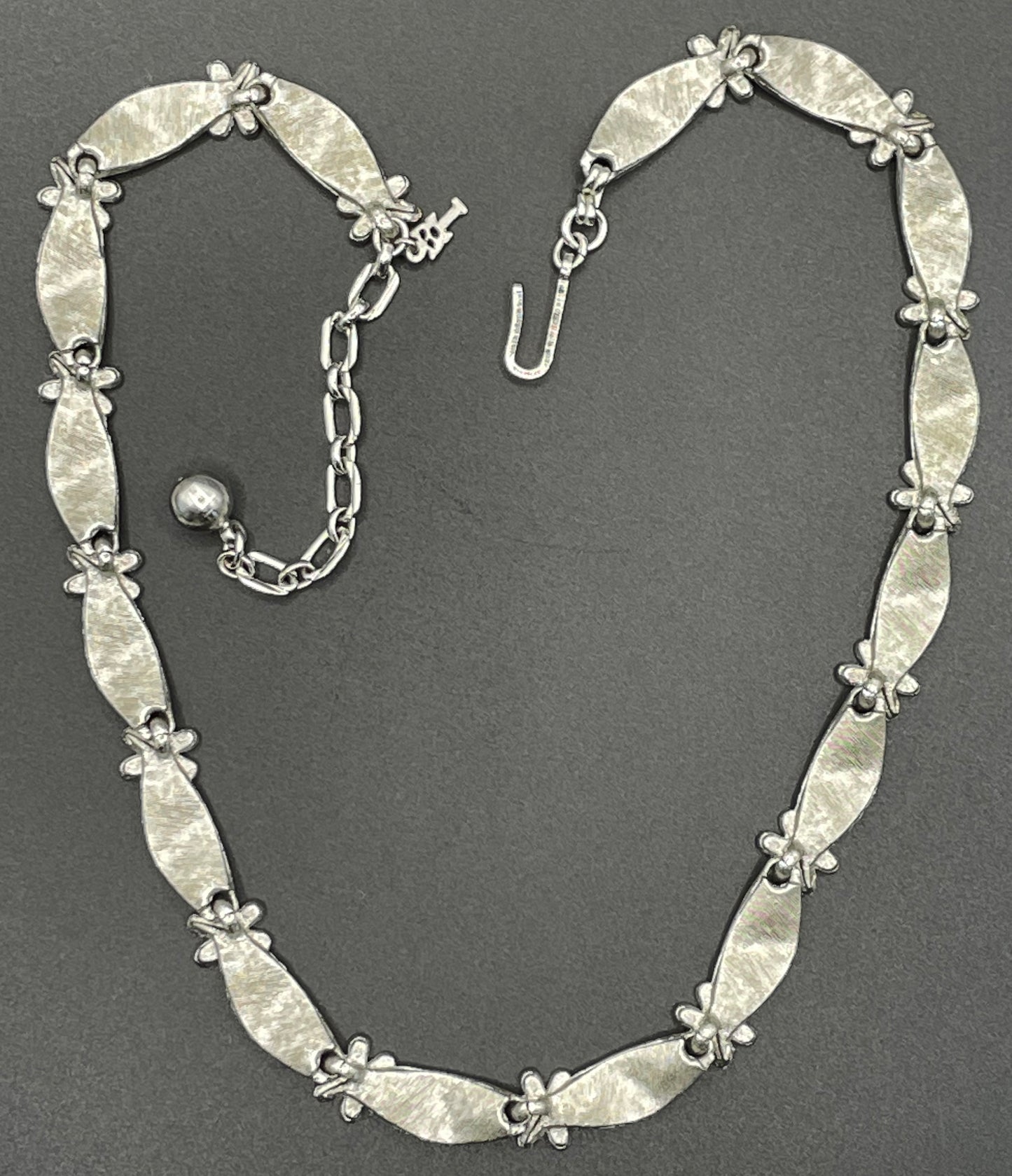 Vintage signed Trifari classic silver tone birthday series ribbon daisy flower choker necklace