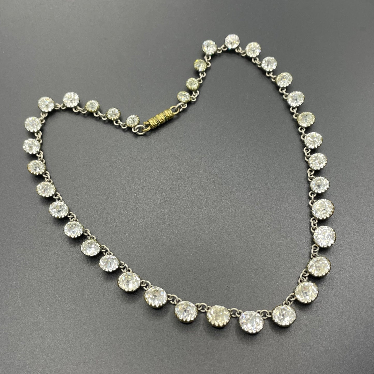 Antique 19th Century post-Georgian Victorian paste riviere necklace, closed cup settings, beautiful foiled rhinestones, gilt metal