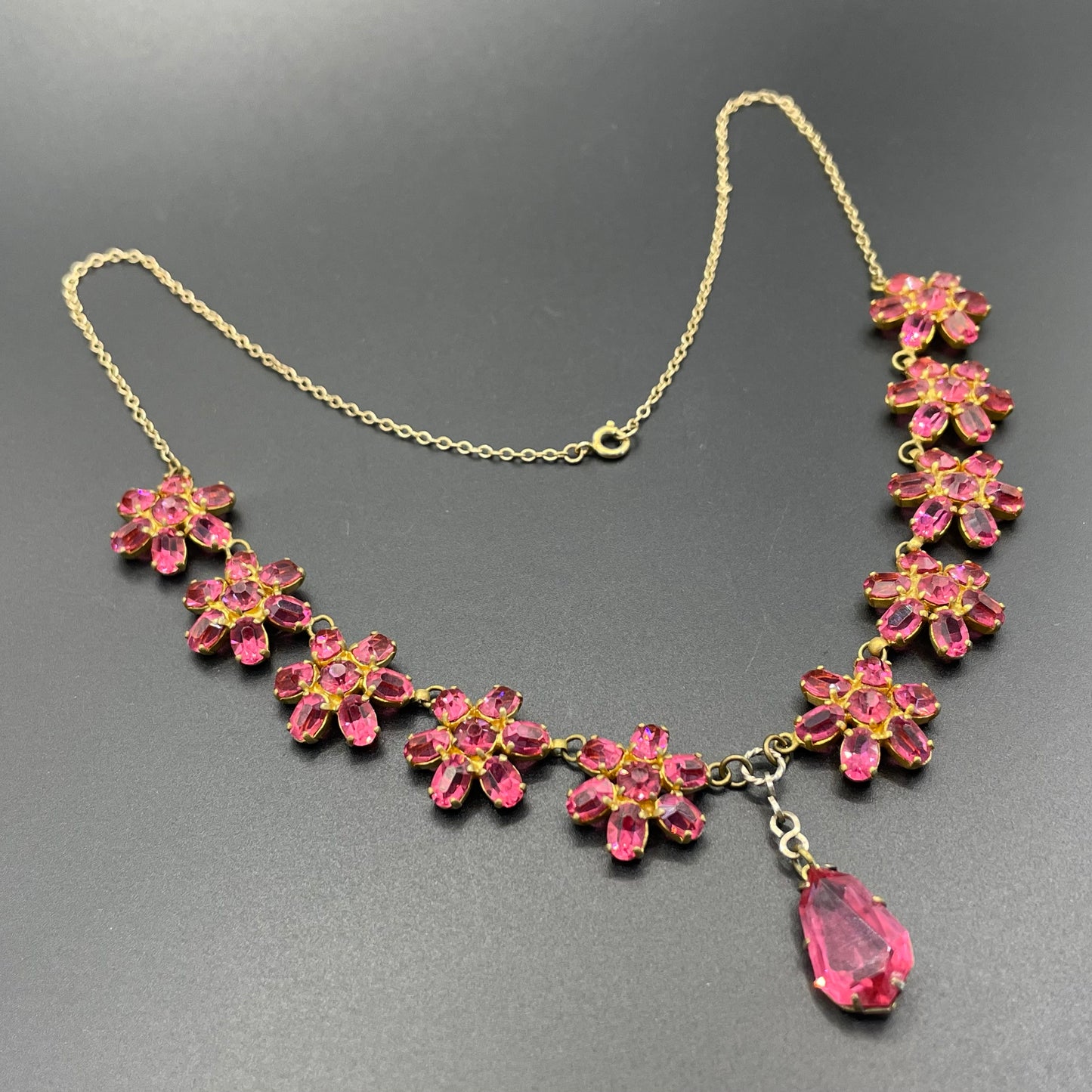 Vintage crystal floral design pink ruby coloured rhinestone necklace and earrings set- bright rhinestones set open-backed in gold tone