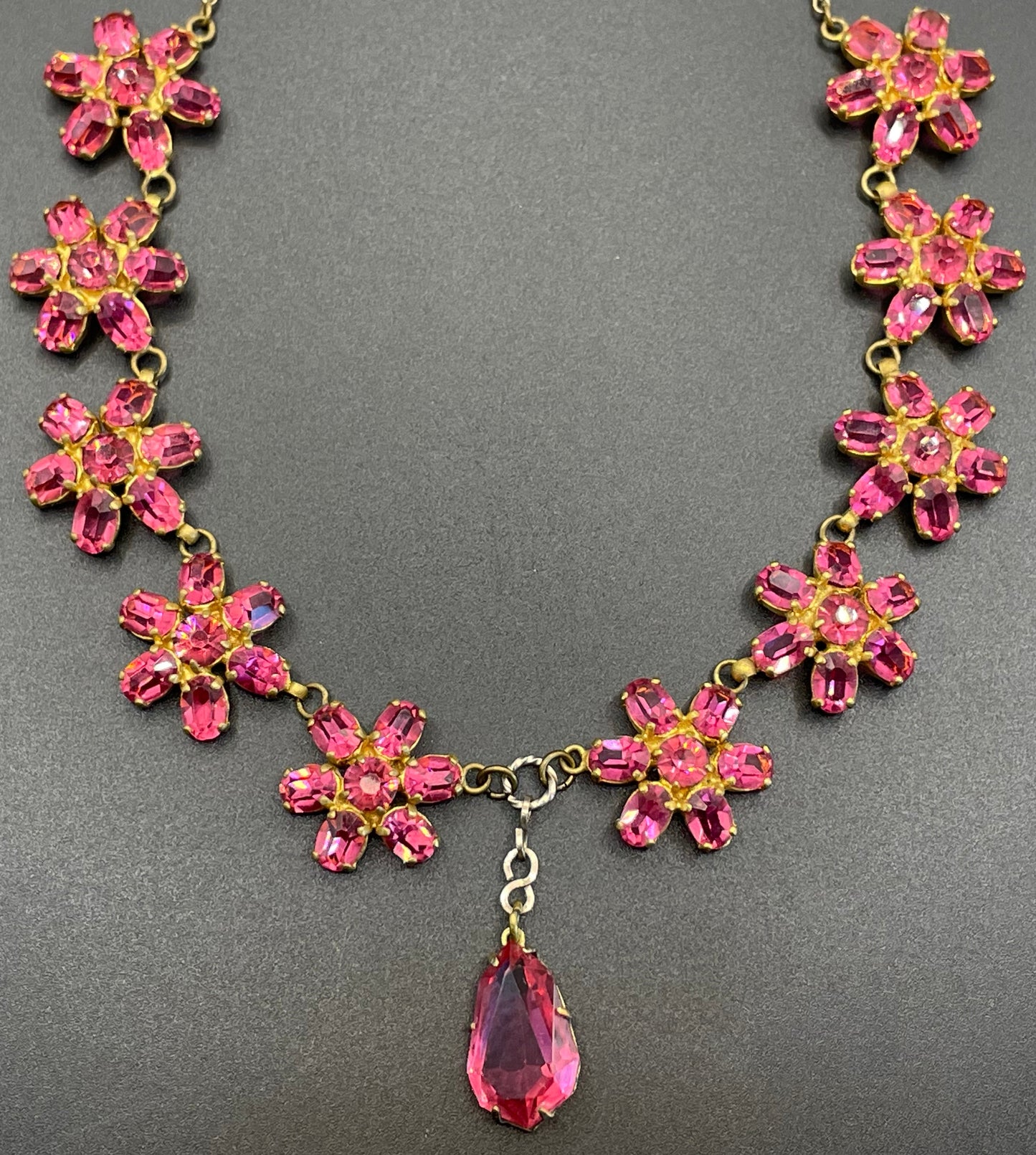 Vintage crystal floral design pink ruby coloured rhinestone necklace and earrings set- bright rhinestones set open-backed in gold tone