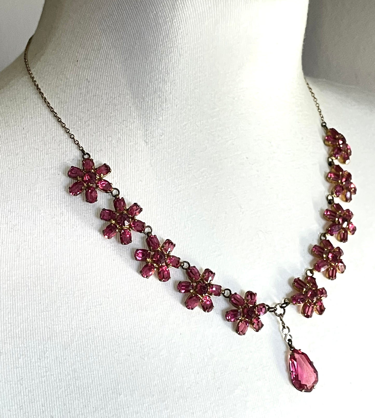 Vintage crystal floral design pink ruby coloured rhinestone necklace and earrings set- bright rhinestones set open-backed in gold tone