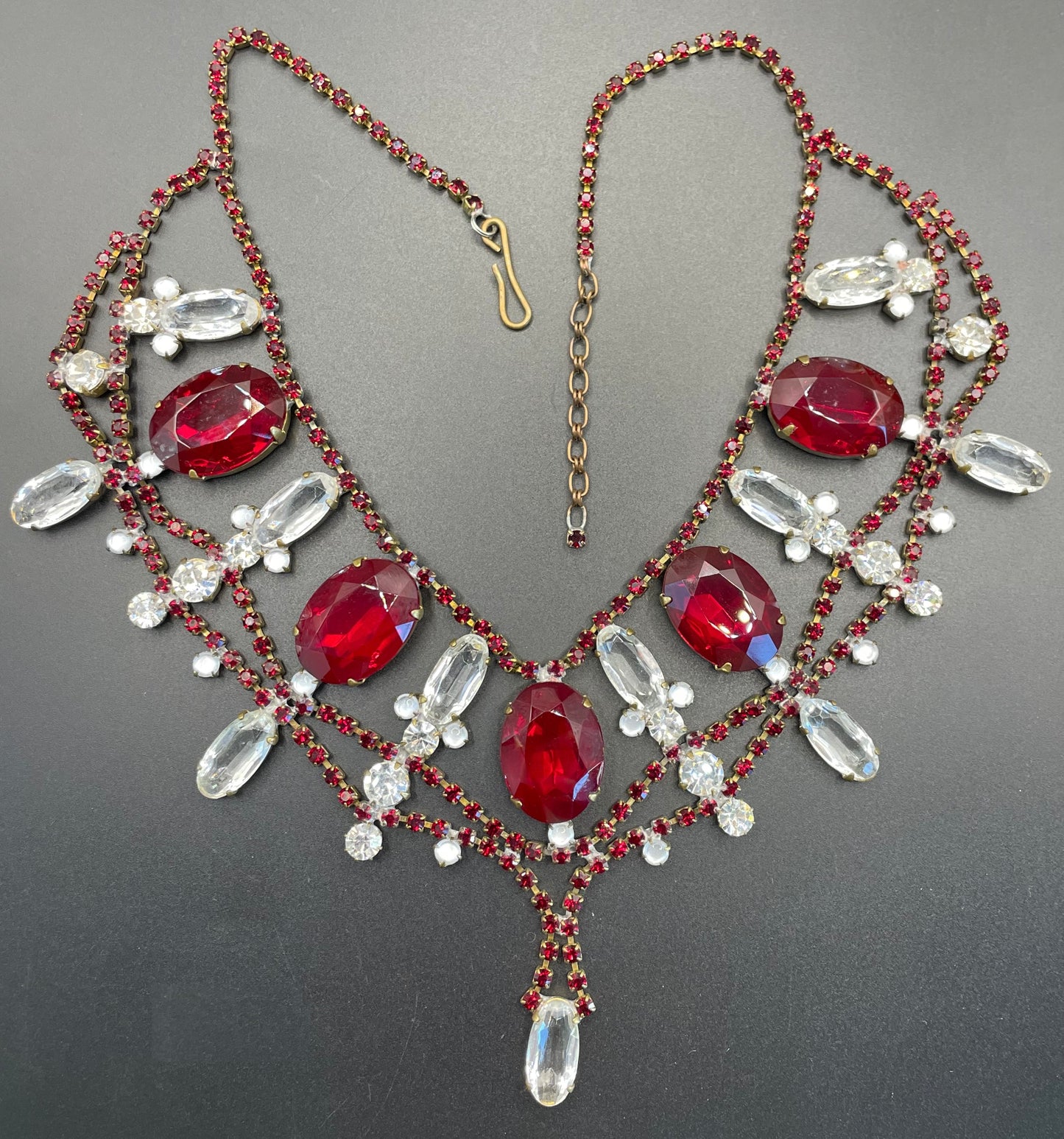 Huge vintage rhinestone festoon  bib necklace, large ice clear and garnet red vibrant Czech rhinestones, a heavy glass showstopping piece