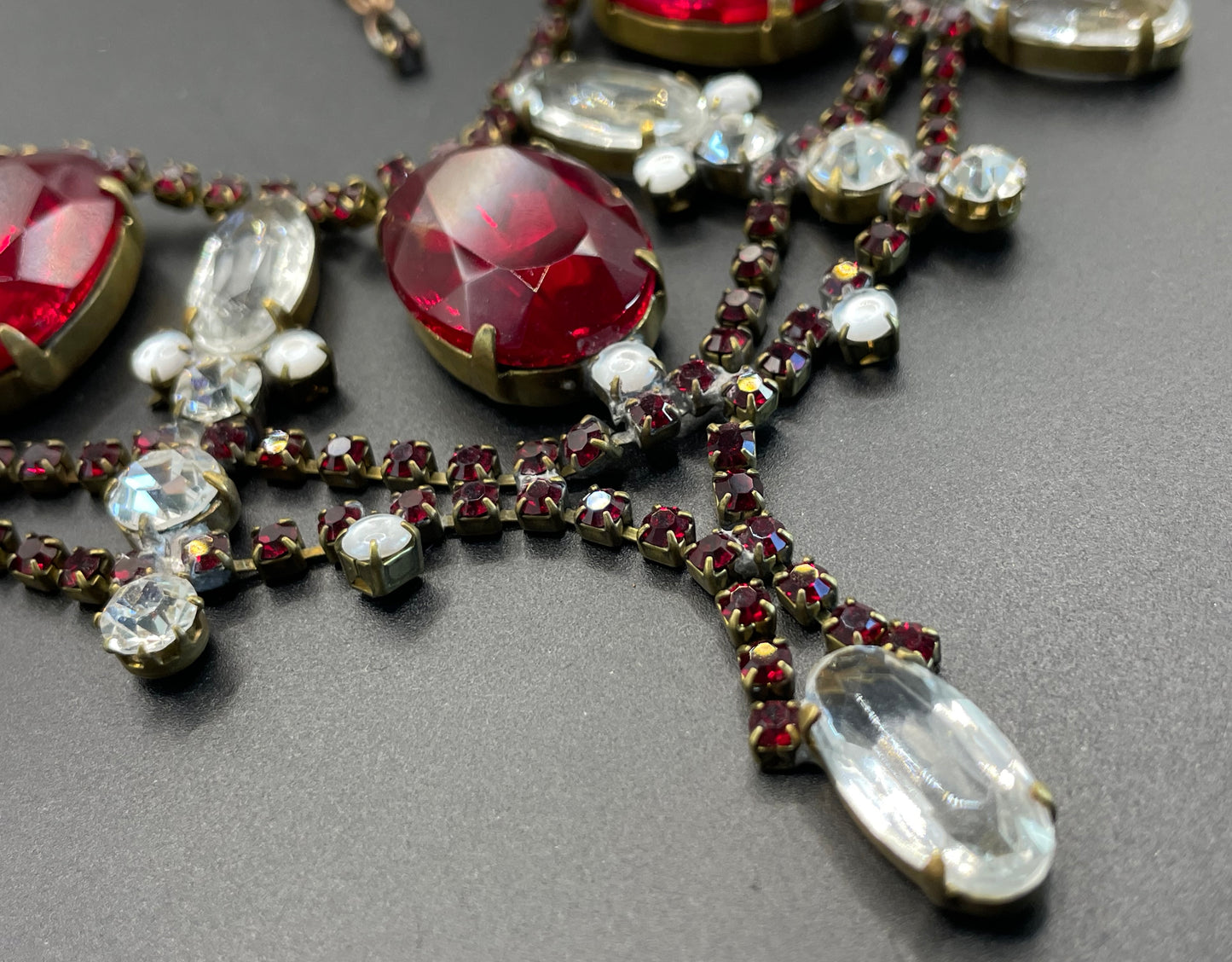 Huge vintage rhinestone festoon  bib necklace, large ice clear and garnet red vibrant Czech rhinestones, a heavy glass showstopping piece