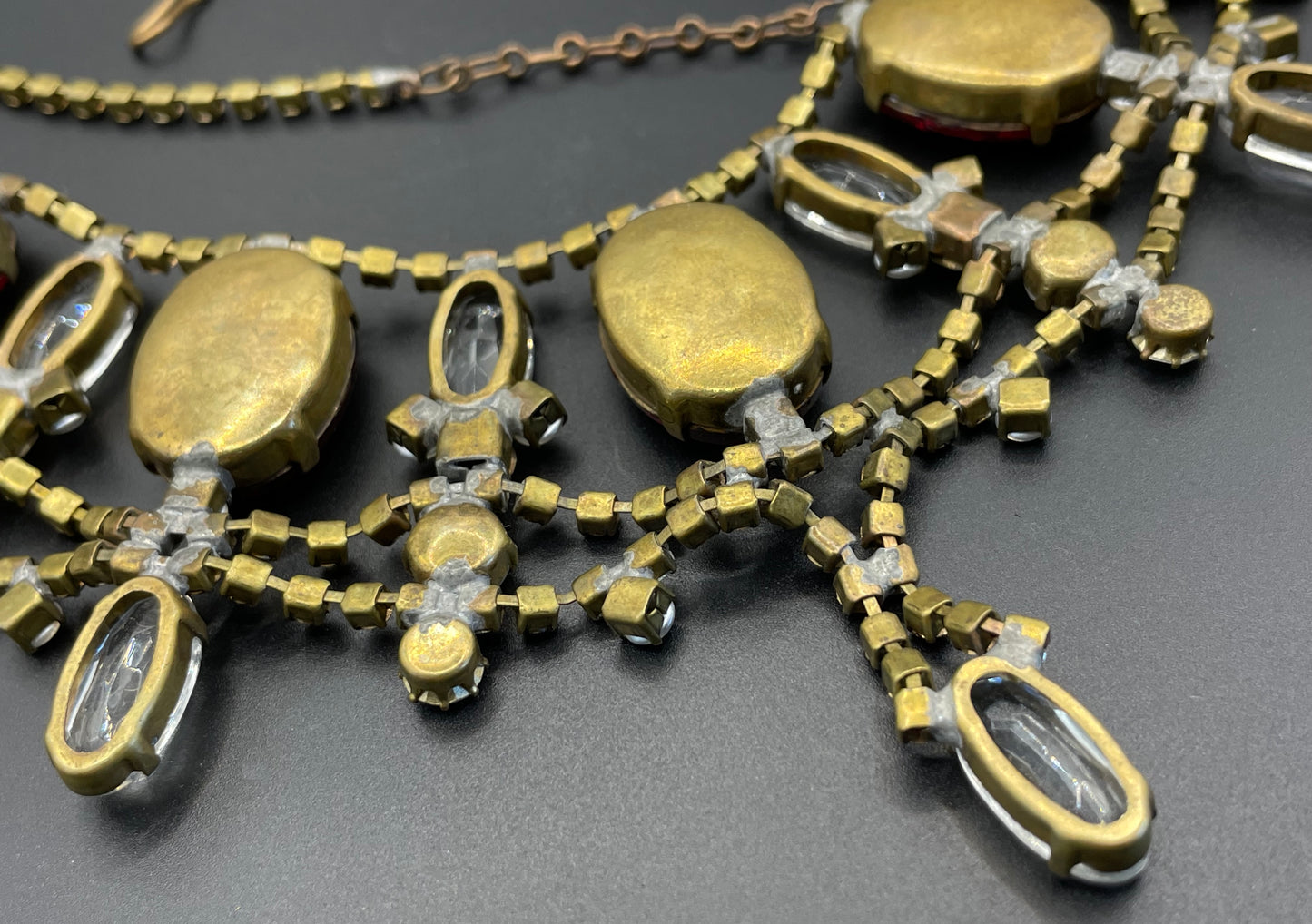 Huge vintage rhinestone festoon  bib necklace, large ice clear and garnet red vibrant Czech rhinestones, a heavy glass showstopping piece