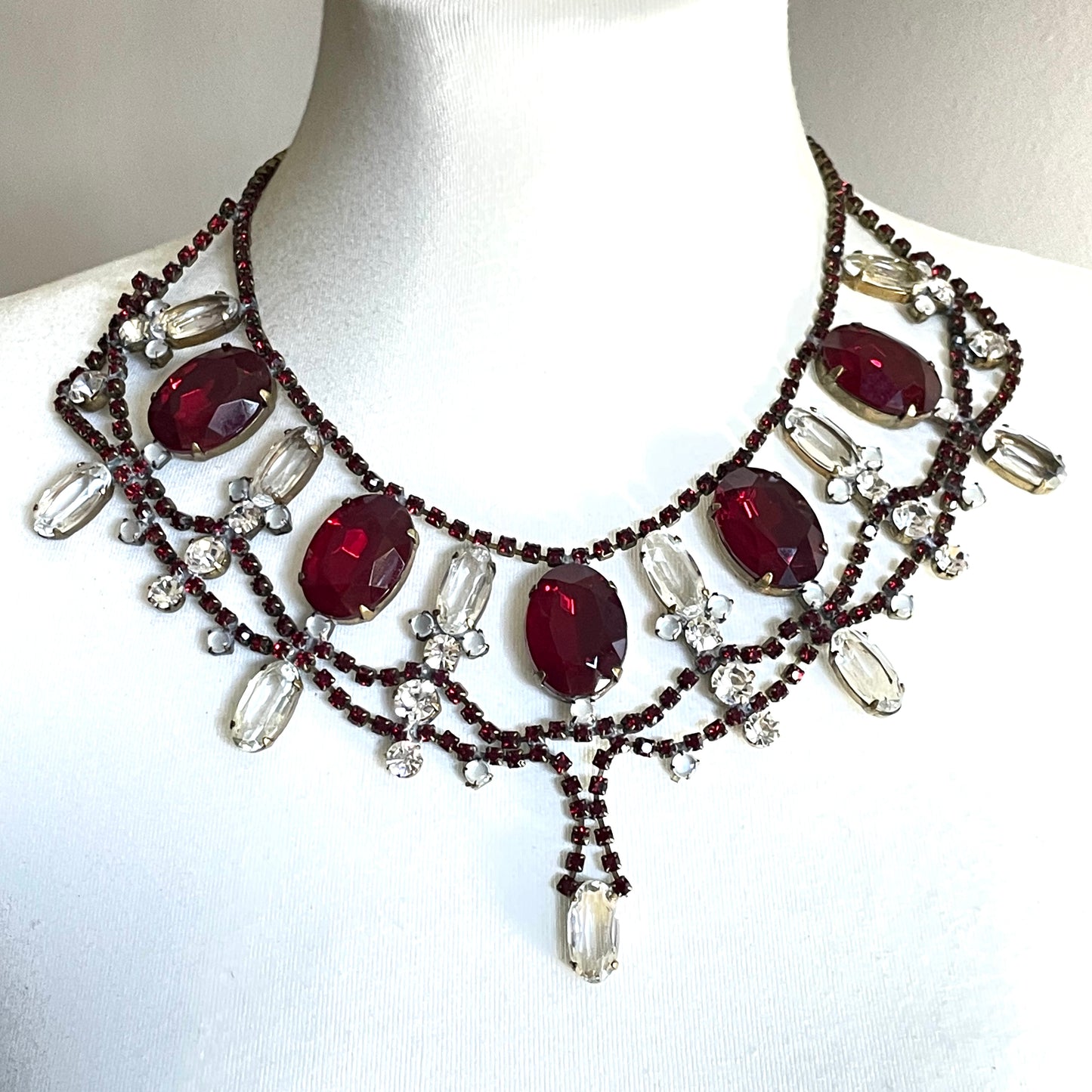 Huge vintage rhinestone festoon  bib necklace, large ice clear and garnet red vibrant Czech rhinestones, a heavy glass showstopping piece