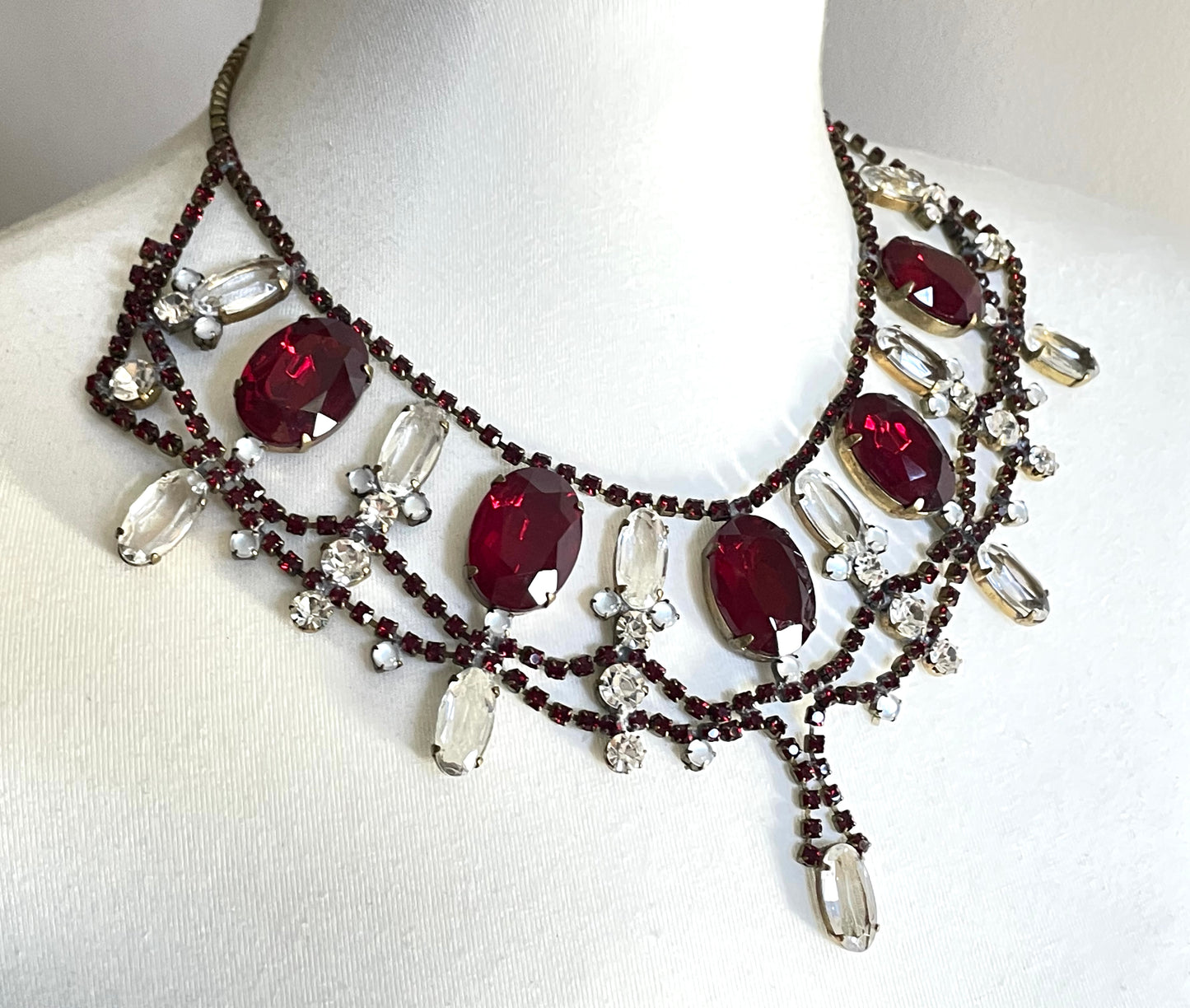 Huge vintage rhinestone festoon  bib necklace, large ice clear and garnet red vibrant Czech rhinestones, a heavy glass showstopping piece