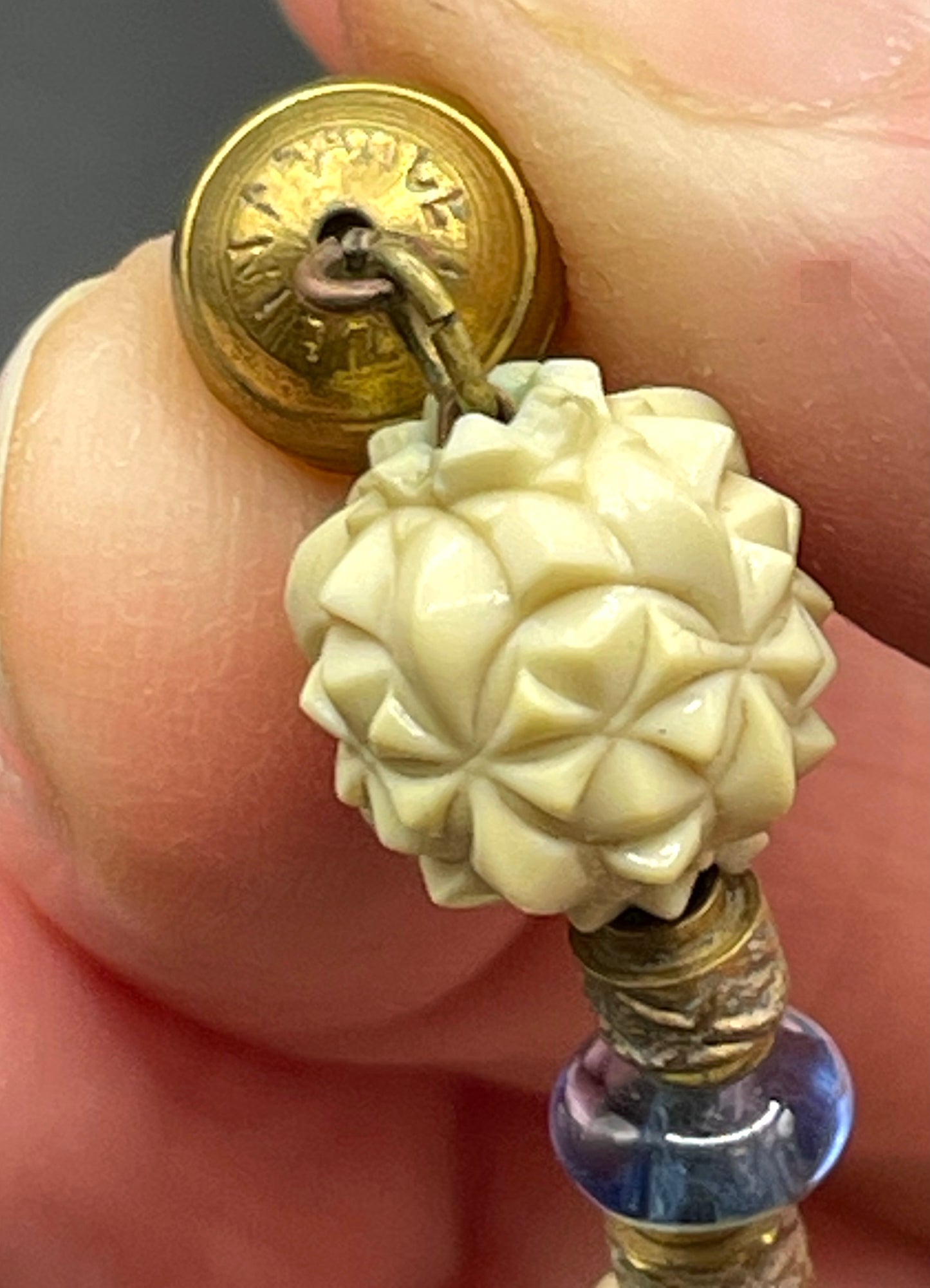 Vintage Louis Rousselet Art Deco carved cream galalith large bead necklace, beehive clasp marked 'Made in France', foxtail chain, blue glass