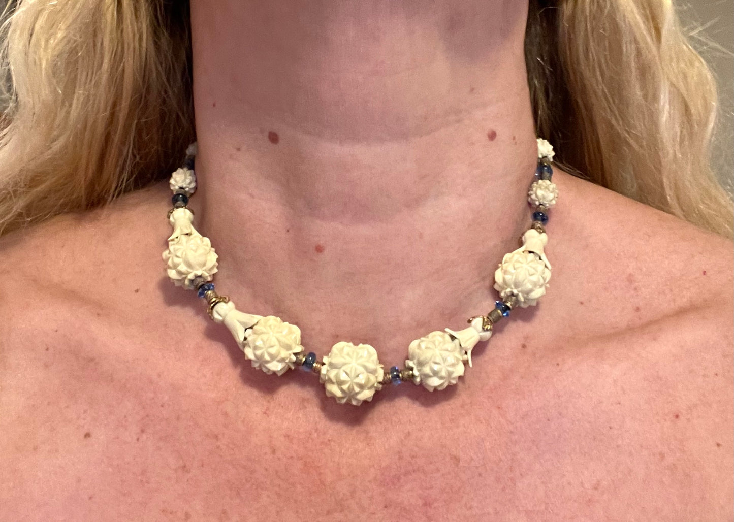 Vintage Louis Rousselet Art Deco carved cream galalith large bead necklace, beehive clasp marked 'Made in France', foxtail chain, blue glass