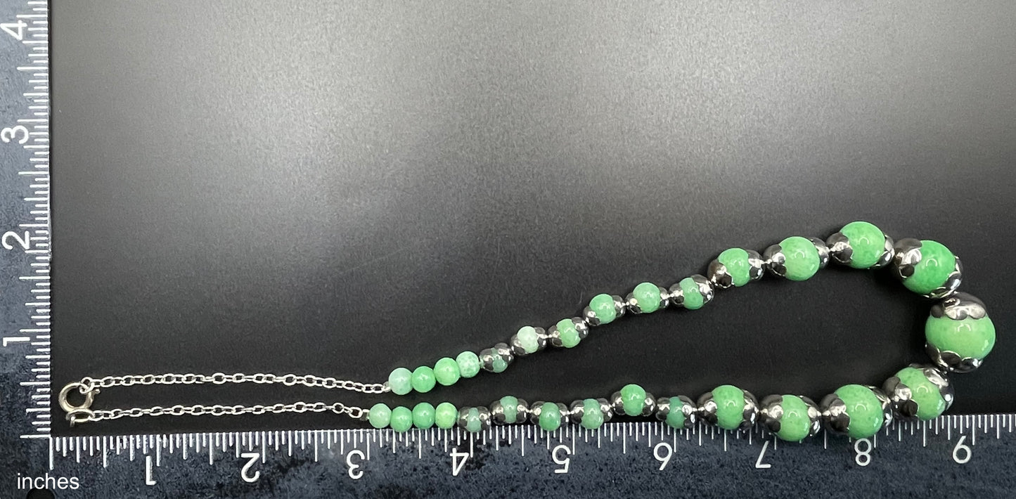 Vintage Art Deco machine age shiny silver tone chrome and green Peking style glass bead necklace, pretty scalloped bead caps