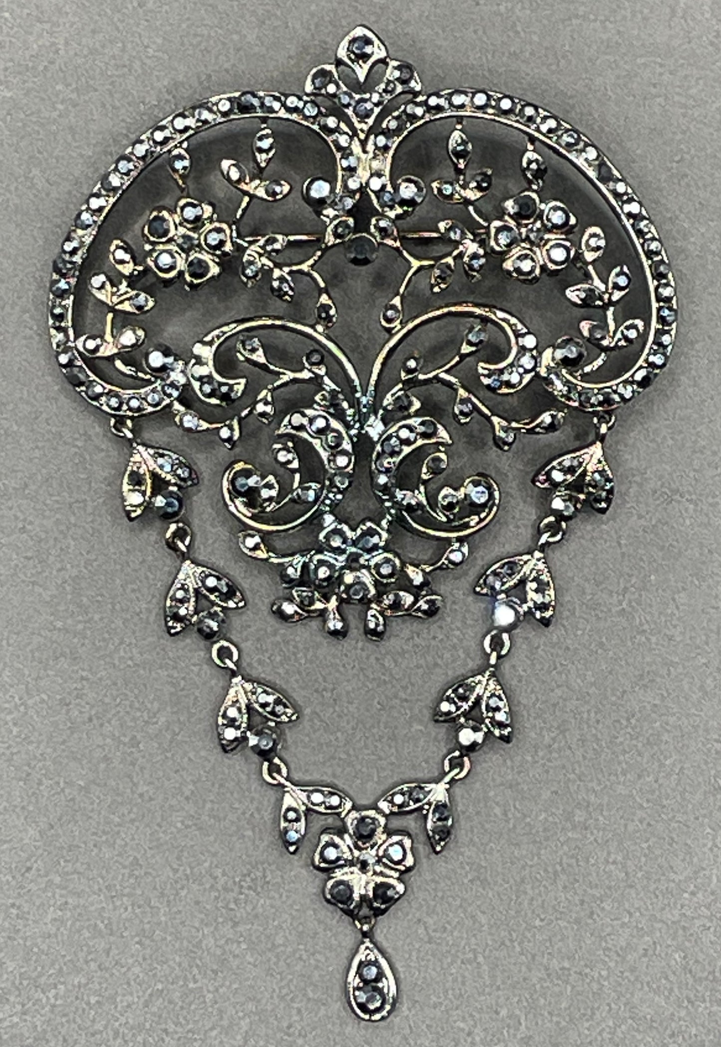 Large vintage Butler and Wilson (B&W) signed blackened silver tone and black French jet rhinestone ornate festoon 'stomacher' brooch