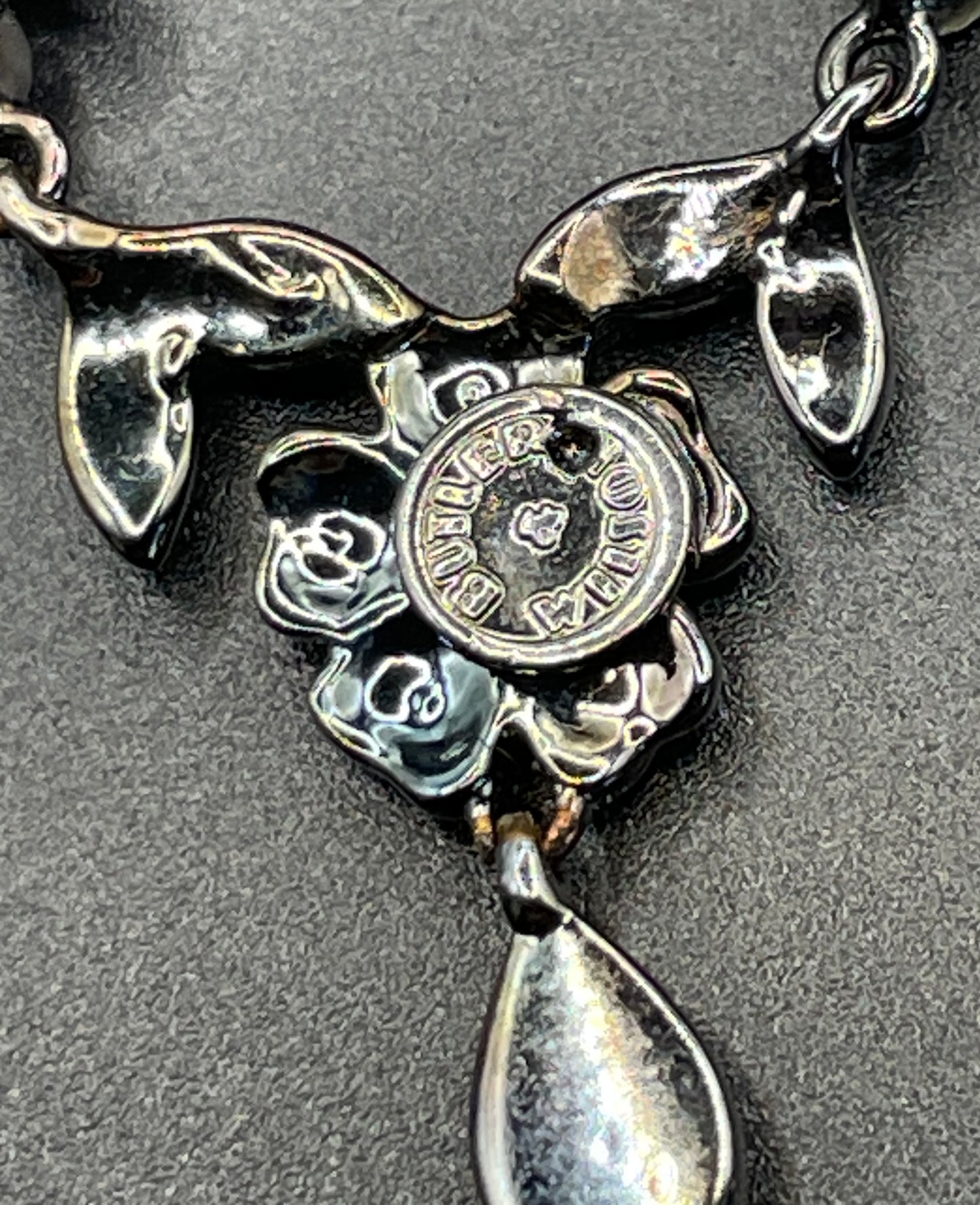 Large vintage Butler and Wilson (B&W) signed blackened silver tone and black French jet rhinestone ornate festoon 'stomacher' brooch