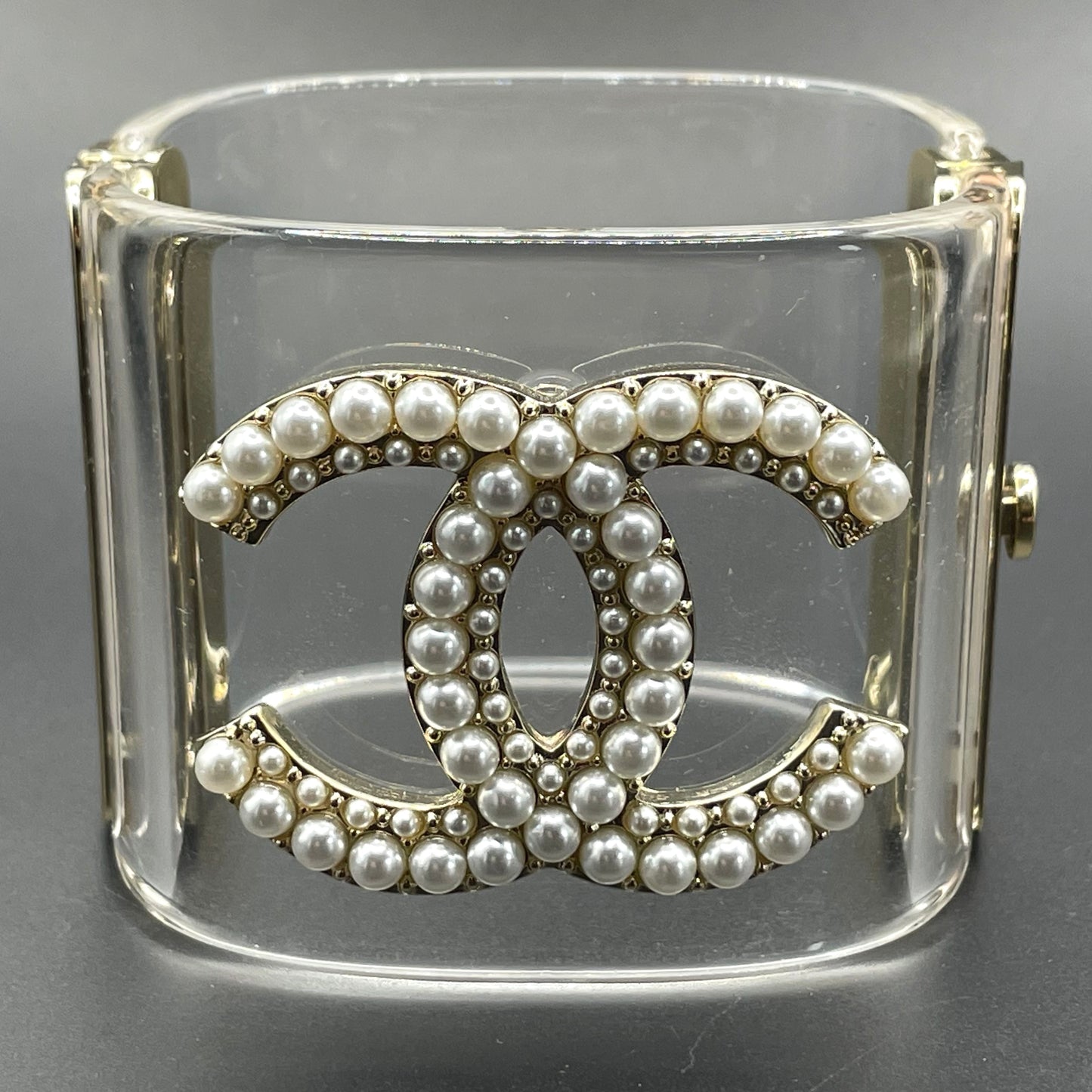 Vintage Chanel CC logo cuff bangle with clear perspex, faux pearl and gold tone, 2018 design