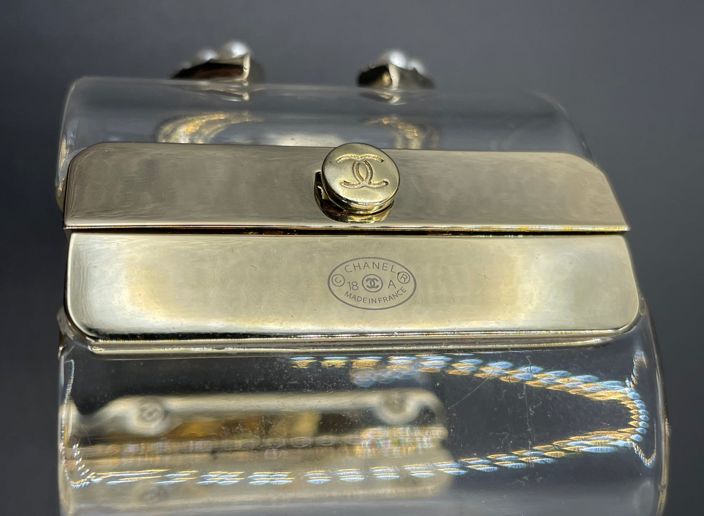 Vintage Chanel CC logo cuff bangle with clear perspex, faux pearl and gold tone, 2018 design