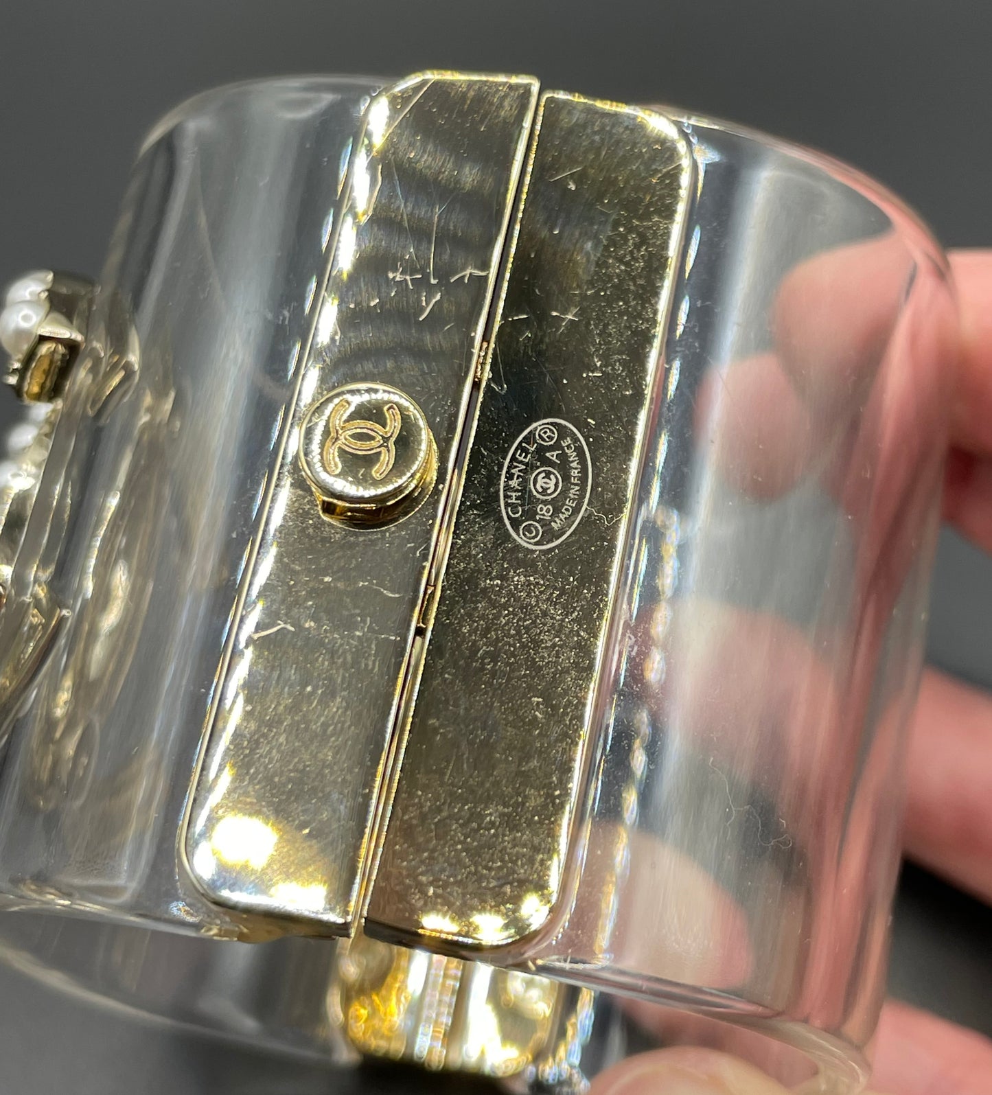 Vintage Chanel CC logo cuff bangle with clear perspex, faux pearl and gold tone, 2018 design