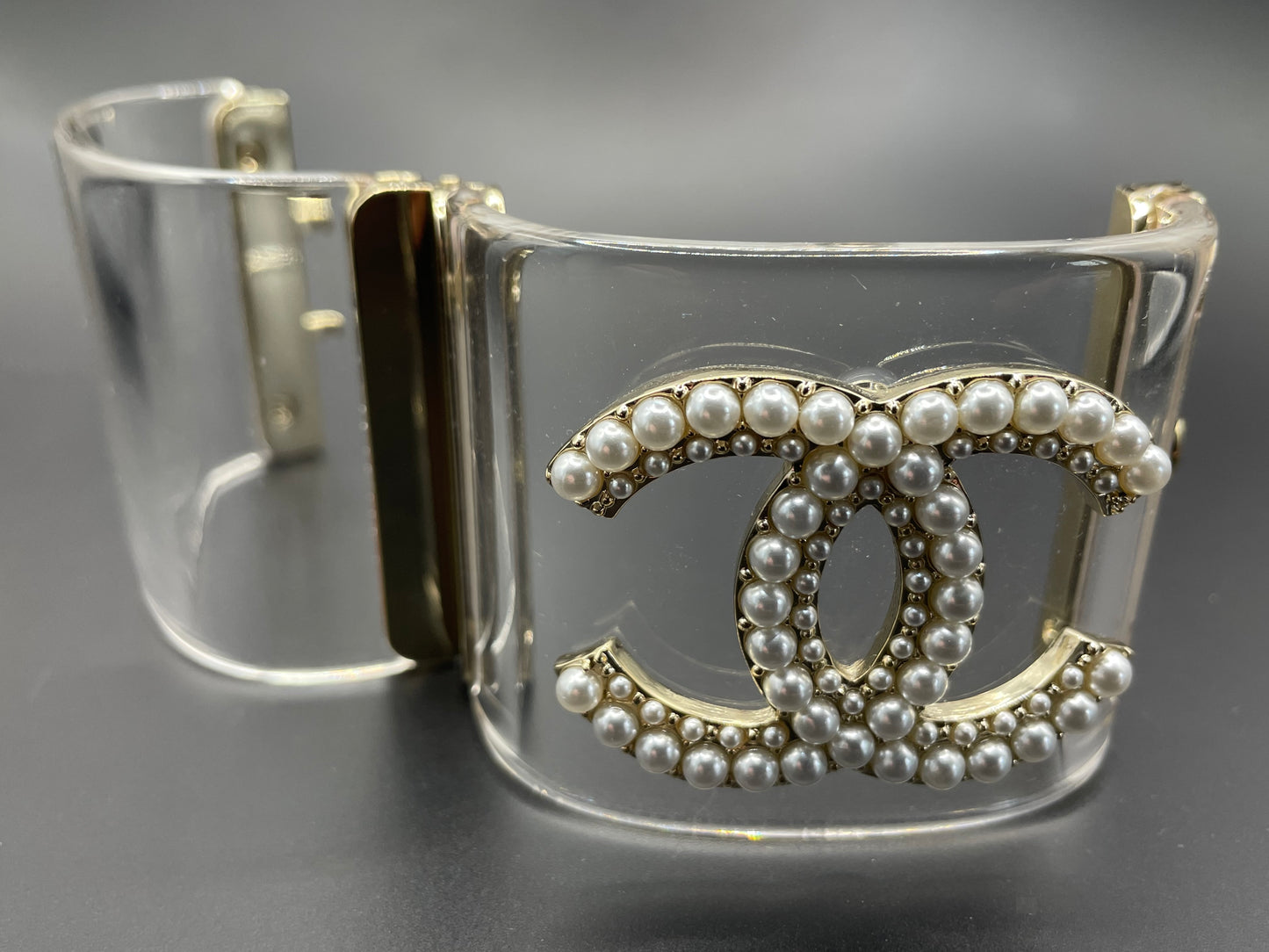 Vintage Chanel CC logo cuff bangle with clear perspex, faux pearl and gold tone, 2018 design