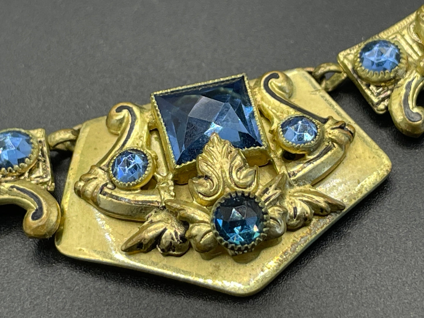 Vintage Neiger brothers sapphire blue rhinestone ornate Art Deco necklace and screw back earrings set in gold tone