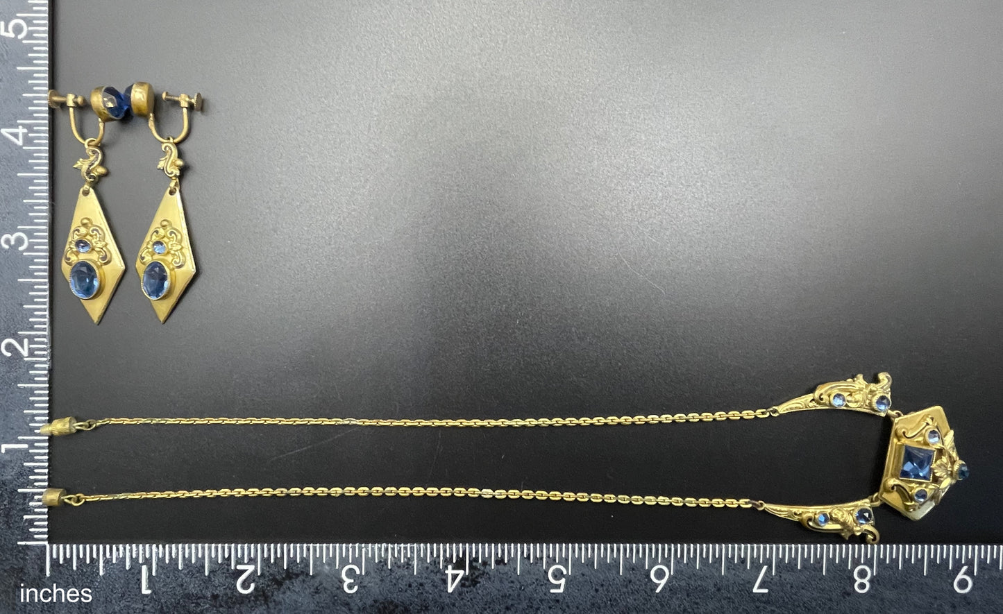 Vintage Neiger brothers sapphire blue rhinestone ornate Art Deco necklace and screw back earrings set in gold tone