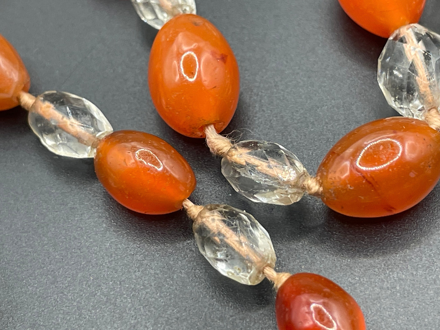 Vintage Art Deco Carnelian gemstone orange & clear glass OR rock crystal faceted bead hand knotted flapper necklace - 1920s, long and heavy