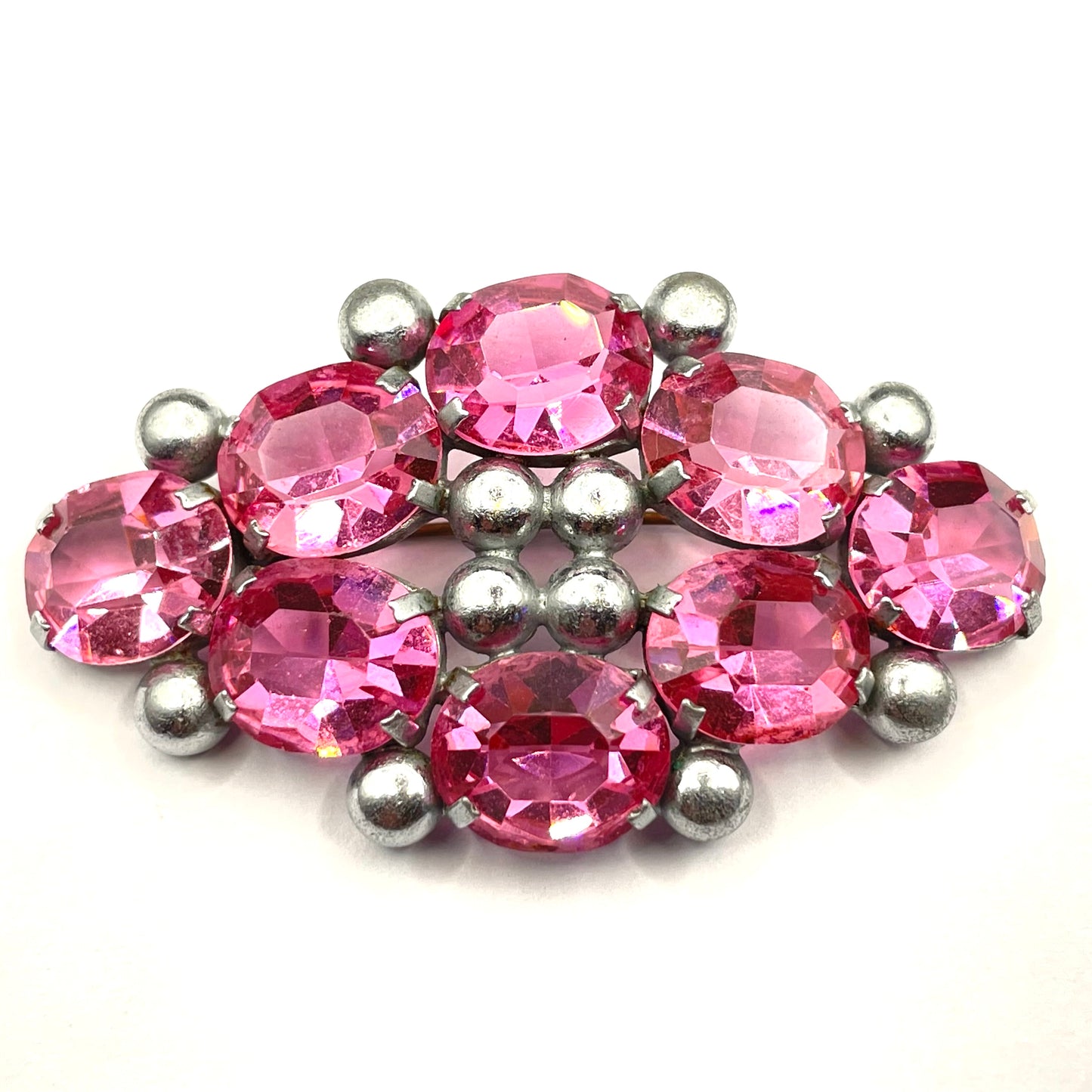 Vintage Art Deco chrome and ruby pink glass open-backed rhinestone brooch pin, machine age