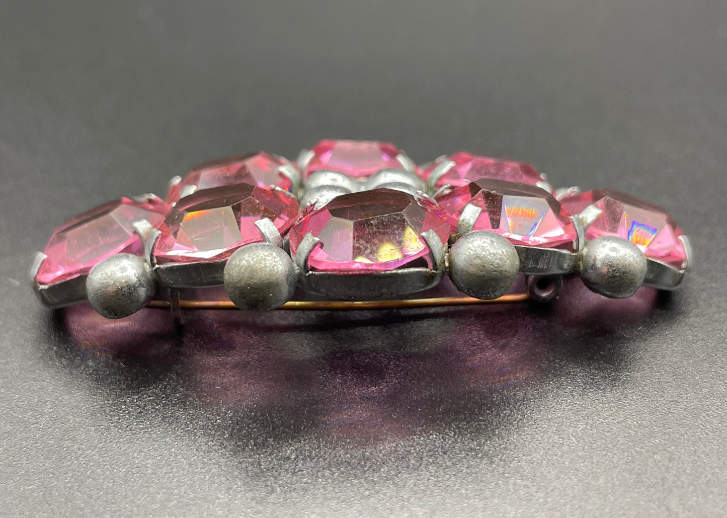 Vintage Art Deco chrome and ruby pink glass open-backed rhinestone brooch pin, machine age