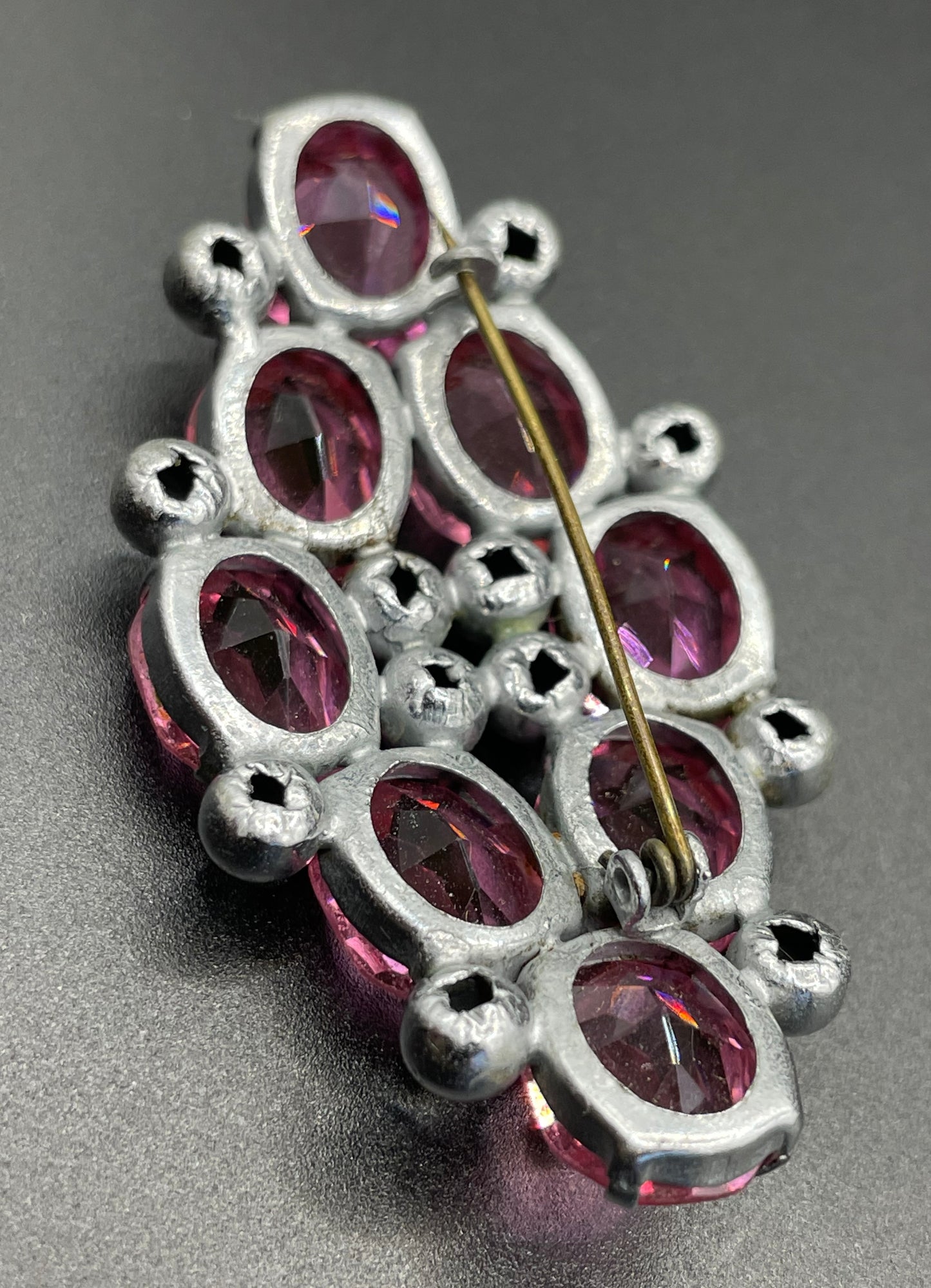 Vintage Art Deco chrome and ruby pink glass open-backed rhinestone brooch pin, machine age