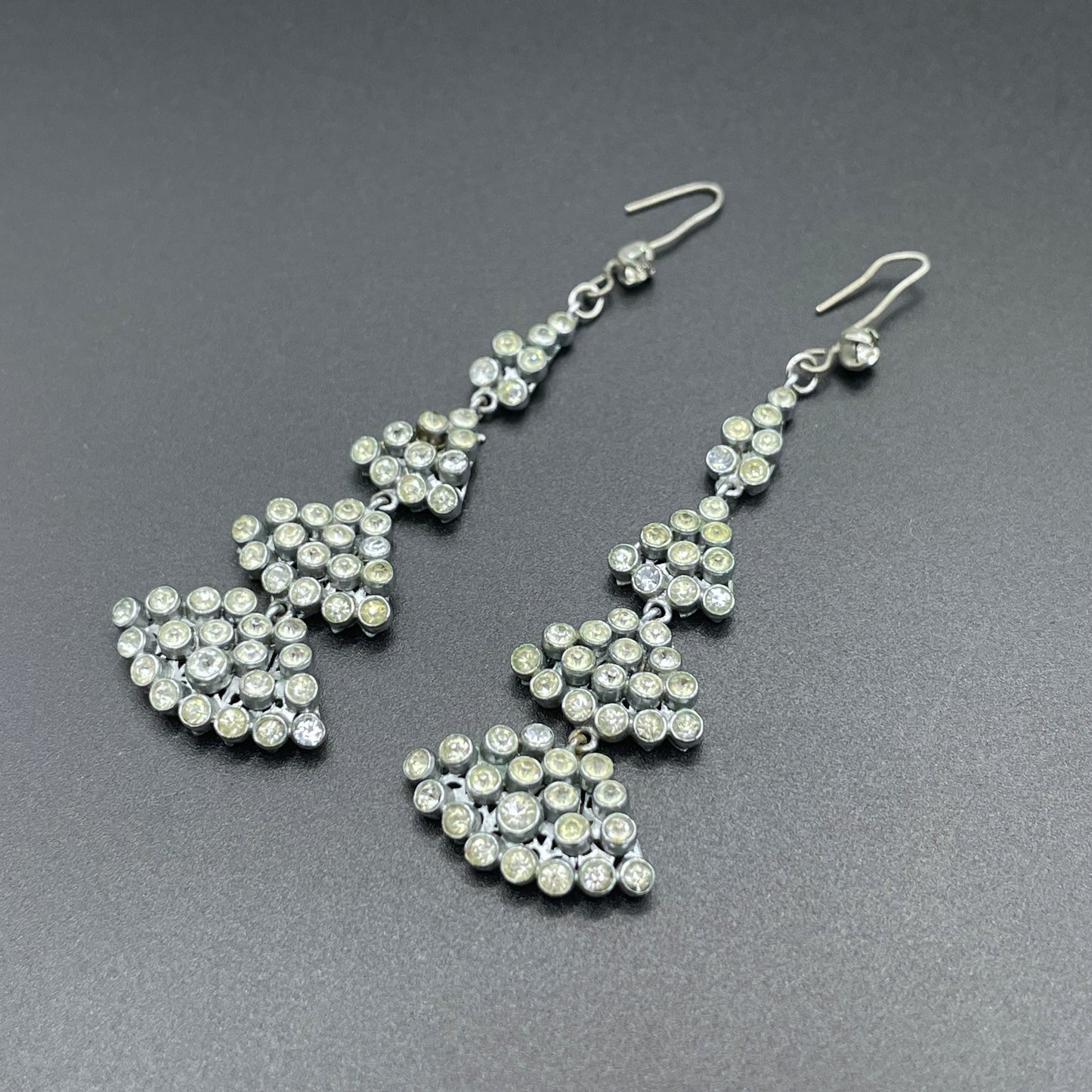Long vintage Art Deco ice clear rhinestone and silver tone filigree dangle statement earrings for pierced ears