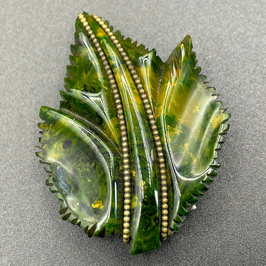 Vintage green marbled Bakelite (verified) and gold tone leaf design dress clip - with slim chain included to double as a pendant