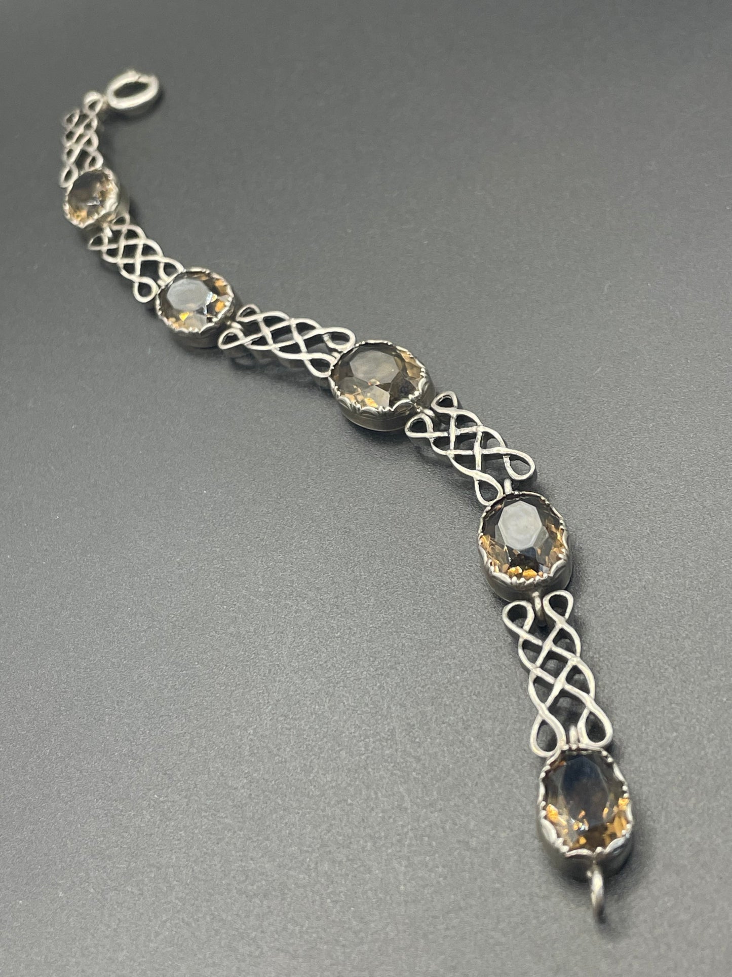 Antique Victorian large smoky topaz Cairngorm gemstone bracelet with sterling silver ornate settings and curlicue sterling silver panels