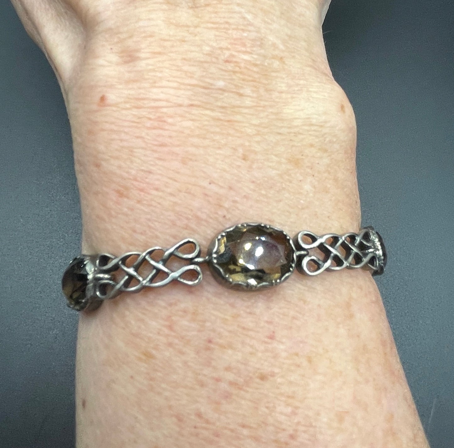 Antique Victorian large smoky topaz Cairngorm gemstone bracelet with sterling silver ornate settings and curlicue sterling silver panels
