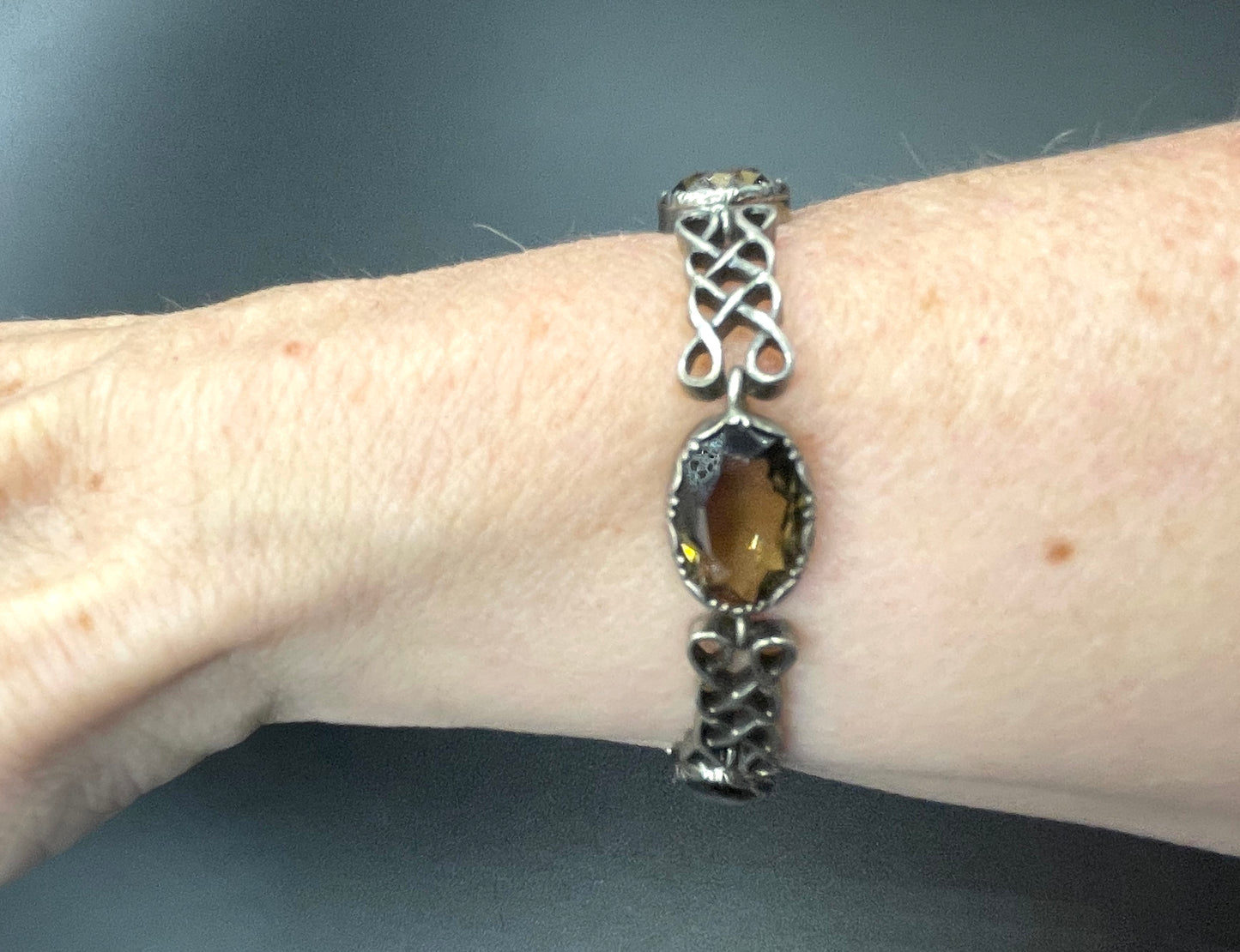 Antique Victorian large smoky topaz Cairngorm gemstone bracelet with sterling silver ornate settings and curlicue sterling silver panels