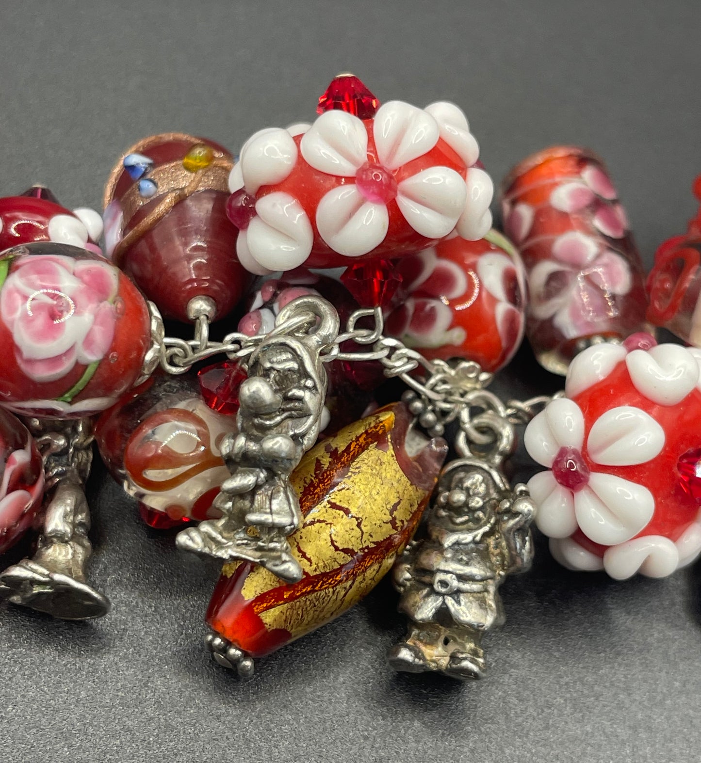 Vintage Disney Snow White and the seven dwarfs 925 sterling silver charm bracelet with a multitude of chunky handcrafted Murano glass beads