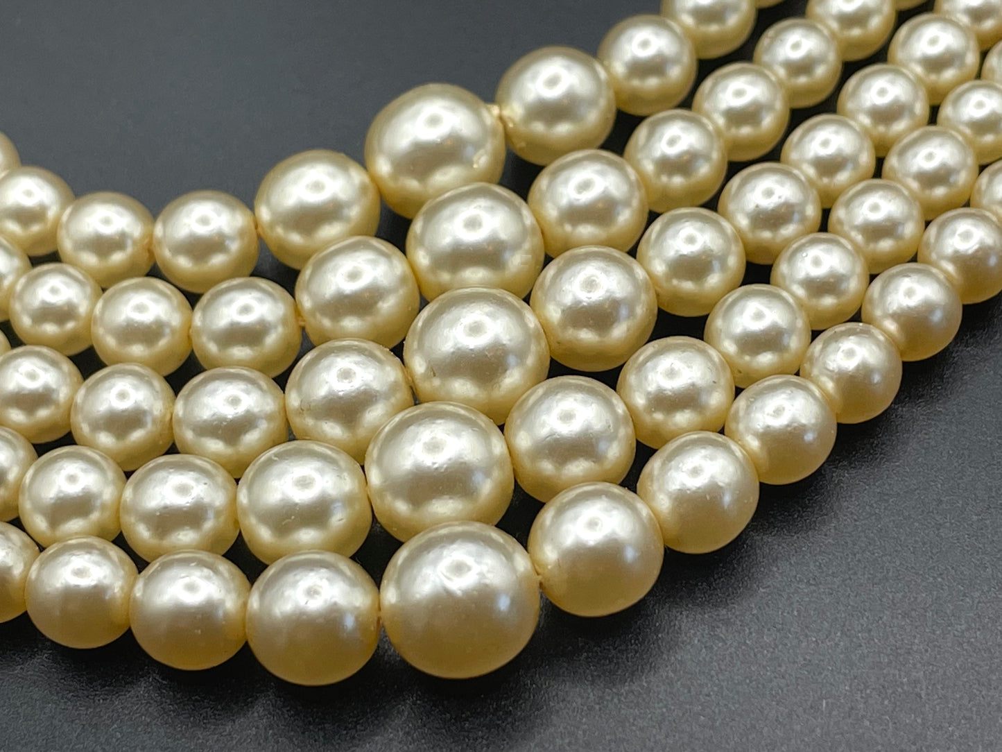 Vintage five strand glass faux pearl necklace with ornate clear rhinestone box clasp, graduated glass pearls