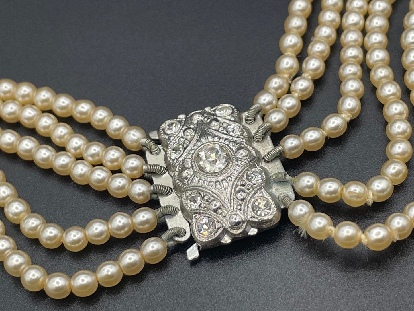 Vintage five strand glass faux pearl necklace with ornate clear rhinestone box clasp, graduated glass pearls