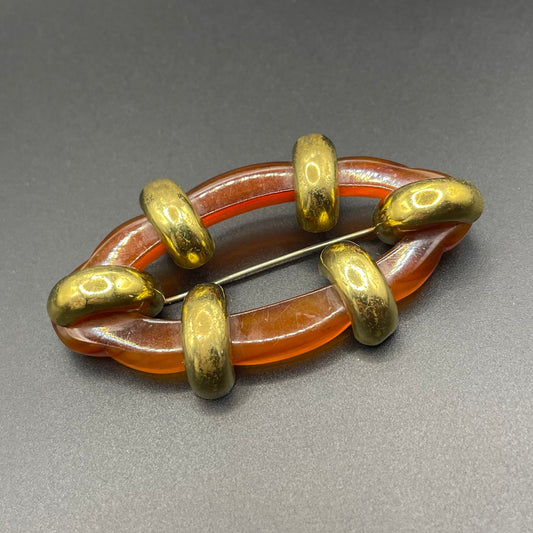 Large vintage rootbeer Bakelite (verified) and gold tone Art Deco machine age geometric brooch, classic 1930s design