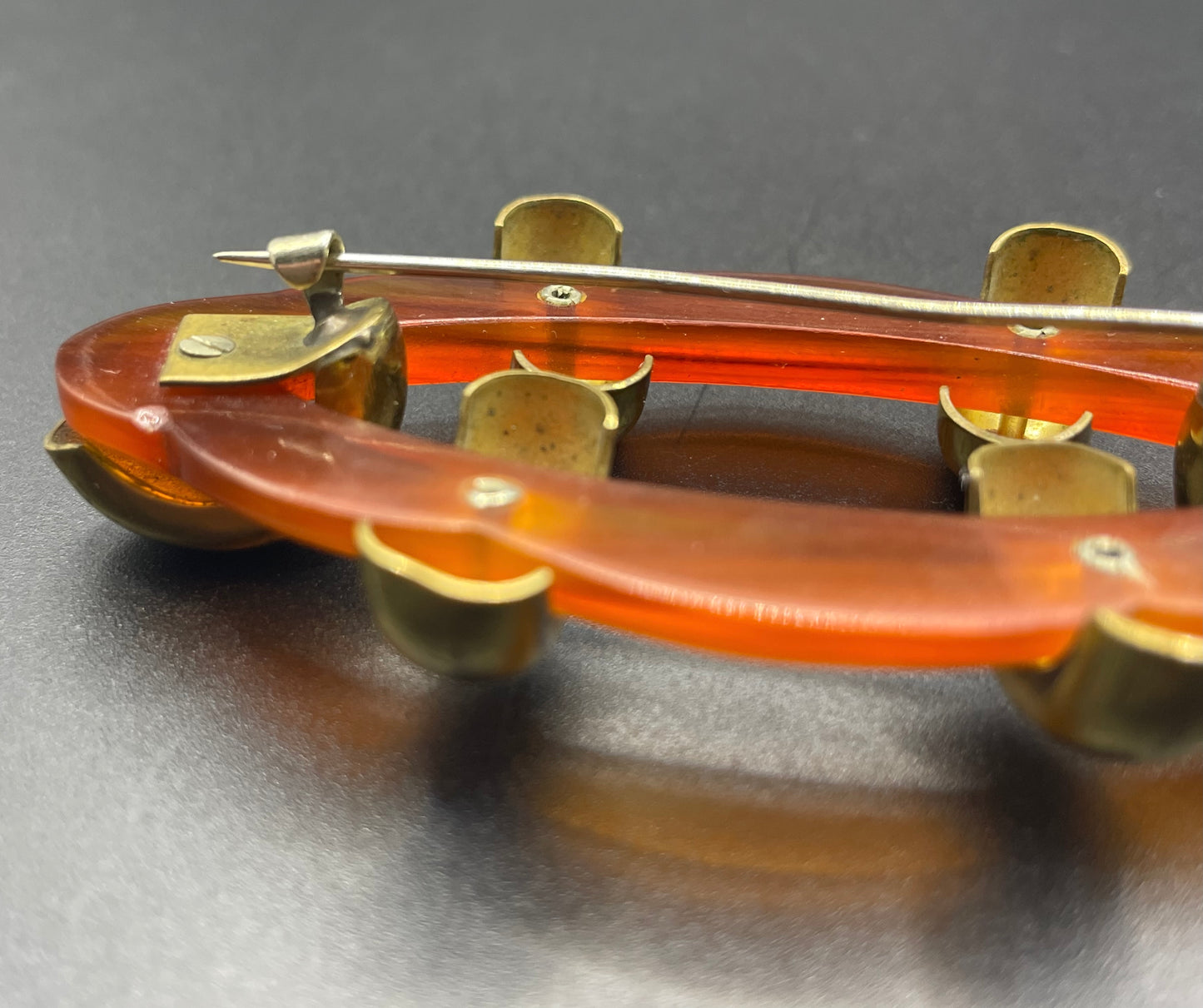 Large vintage rootbeer Bakelite (verified) and gold tone Art Deco machine age geometric brooch, classic 1930s design