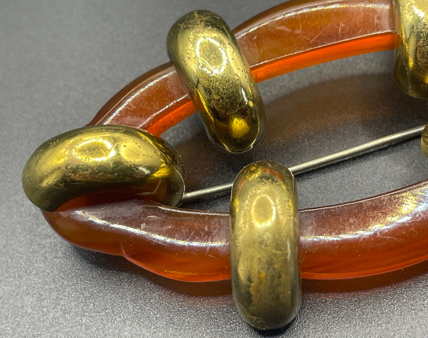 Large vintage rootbeer Bakelite (verified) and gold tone Art Deco machine age geometric brooch, classic 1930s design