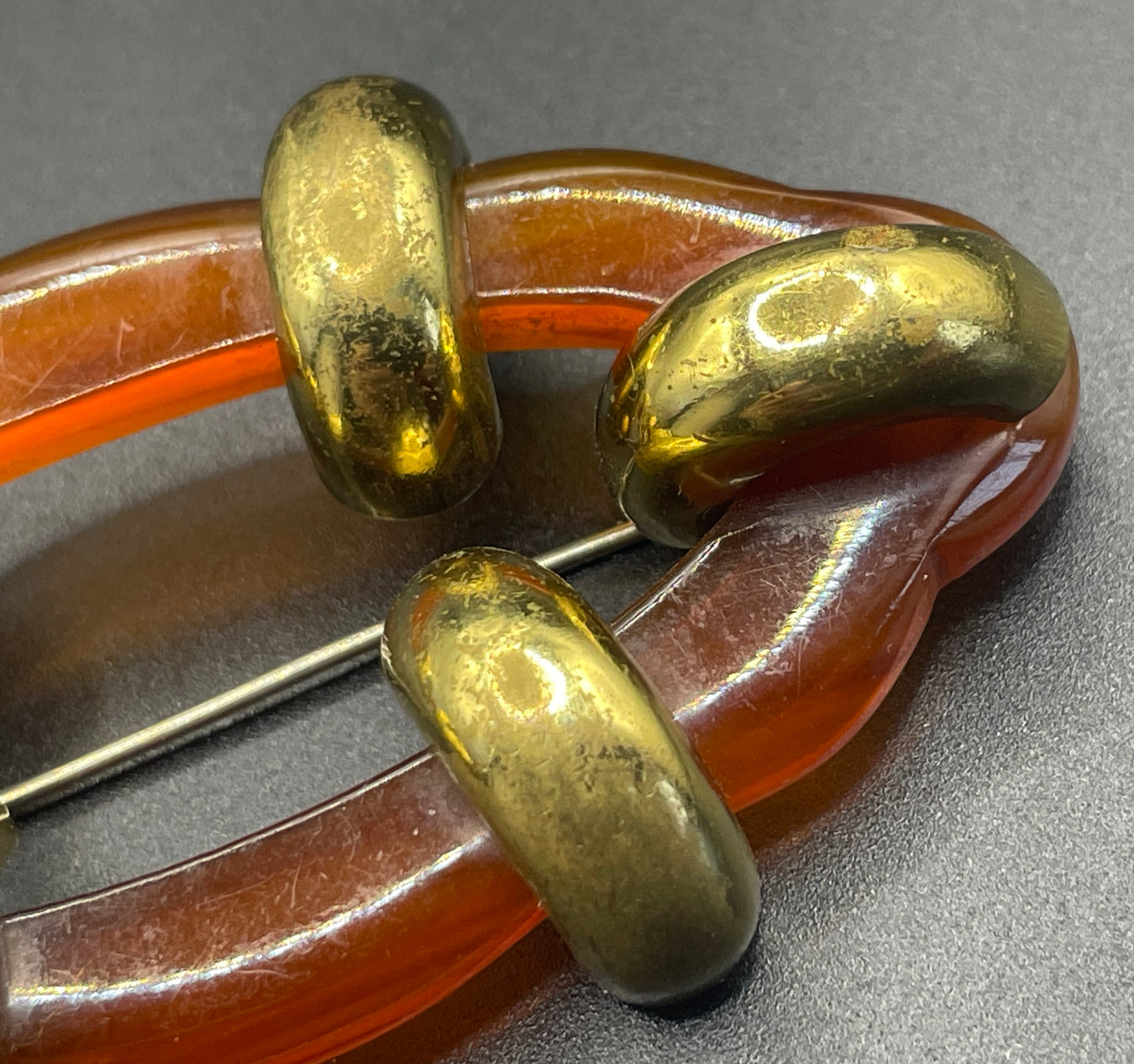 Large vintage rootbeer Bakelite (verified) and gold tone Art Deco machine age geometric brooch, classic 1930s design
