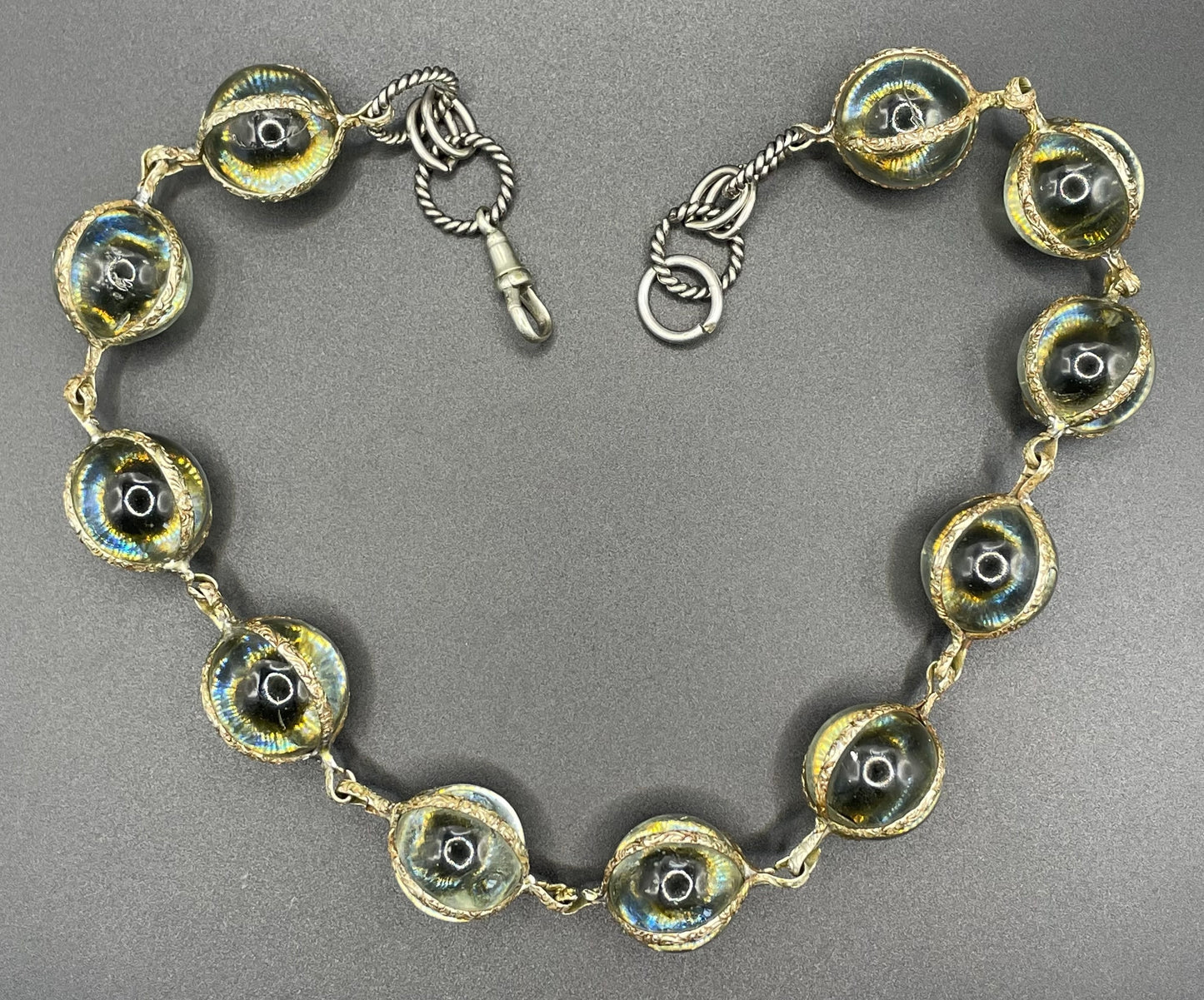 Unusual antique 'pools of light' STYLE choker necklace with undrilled GLASS orbs in ornate, but rustic silver tone settings with subtle gilt