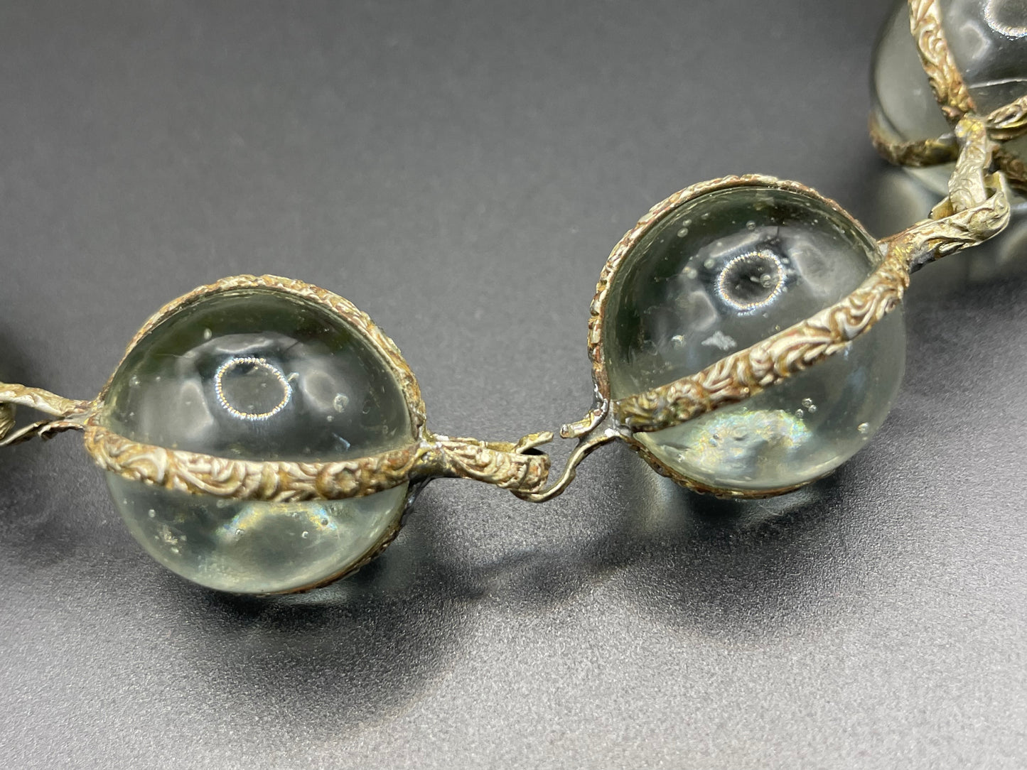 Unusual antique 'pools of light' STYLE choker necklace with undrilled GLASS orbs in ornate, but rustic silver tone settings with subtle gilt