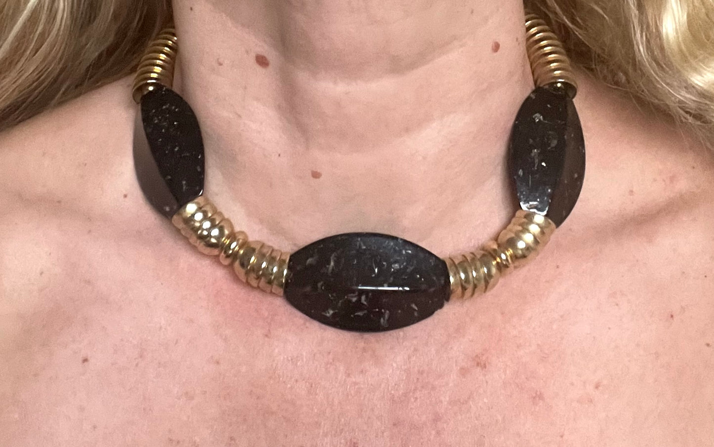 Vintage Jakob Bengel Art Deco 1930s machine age collar necklace with gold tone stacked cup beads and huge black, sparkly galalith beads