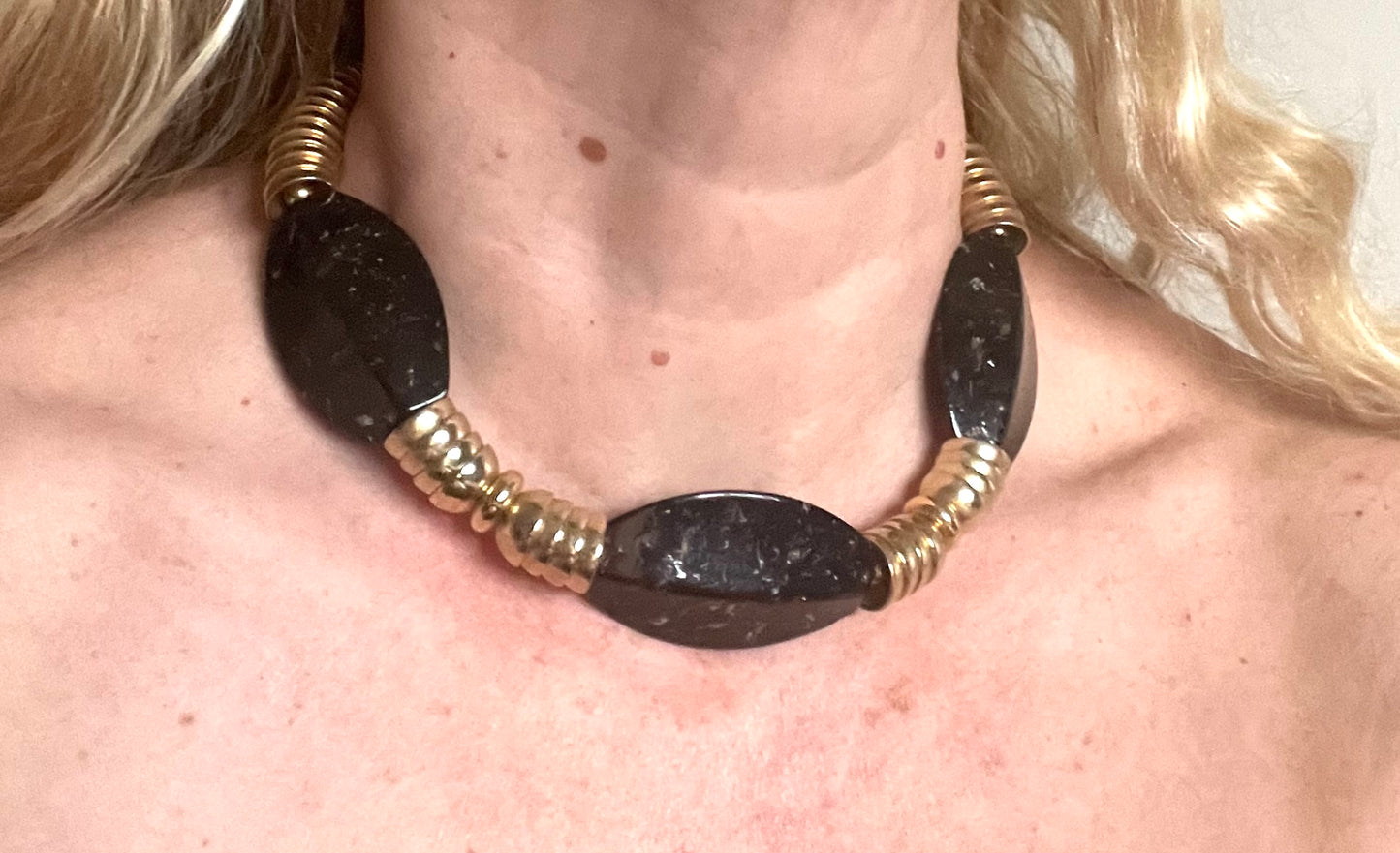 Vintage Jakob Bengel Art Deco 1930s machine age collar necklace with gold tone stacked cup beads and huge black, sparkly galalith beads