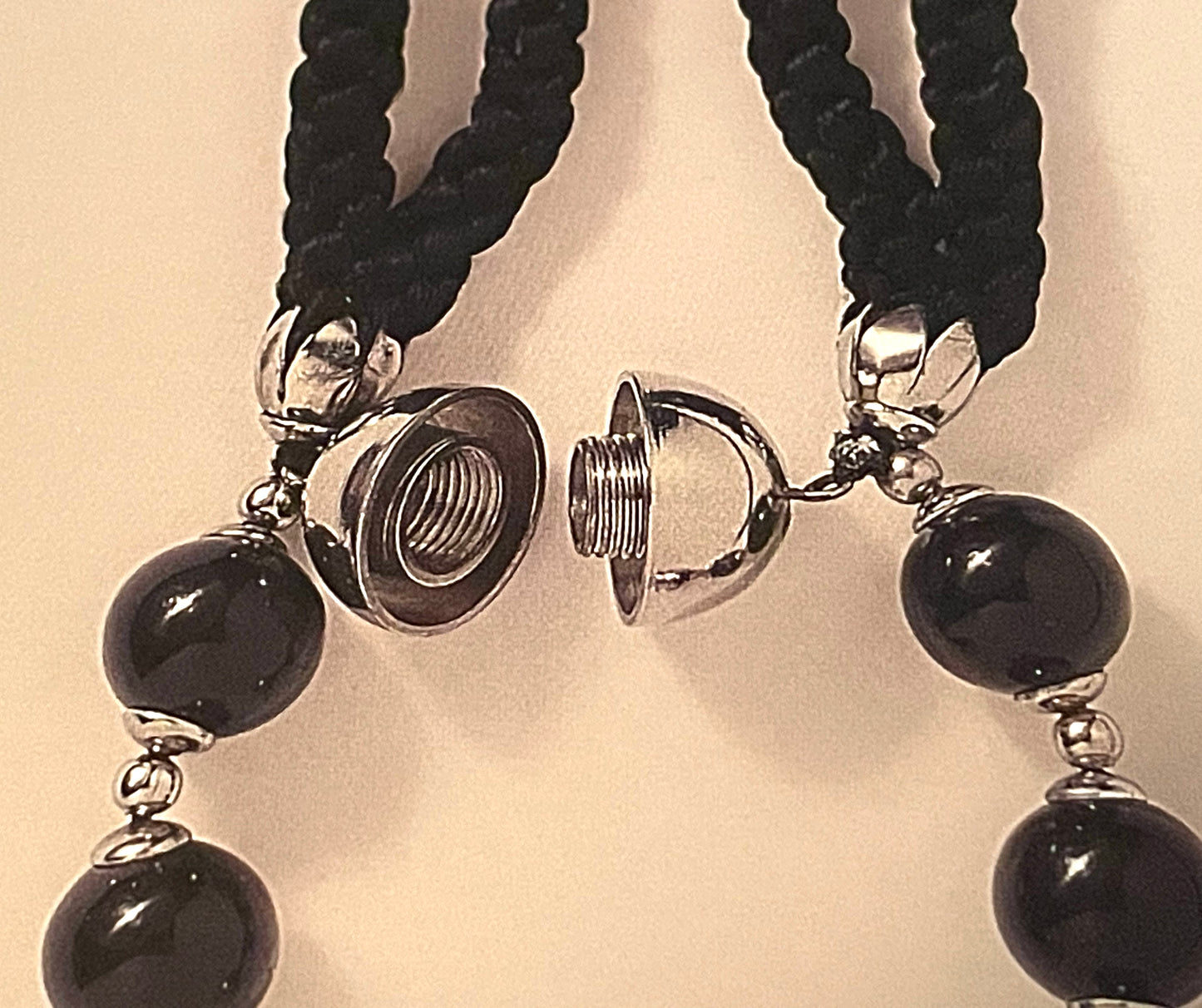 Vintage Jakob Bengel Art Deco 1930s machine age collar necklace with gold tone stacked cup beads and huge black, sparkly galalith beads