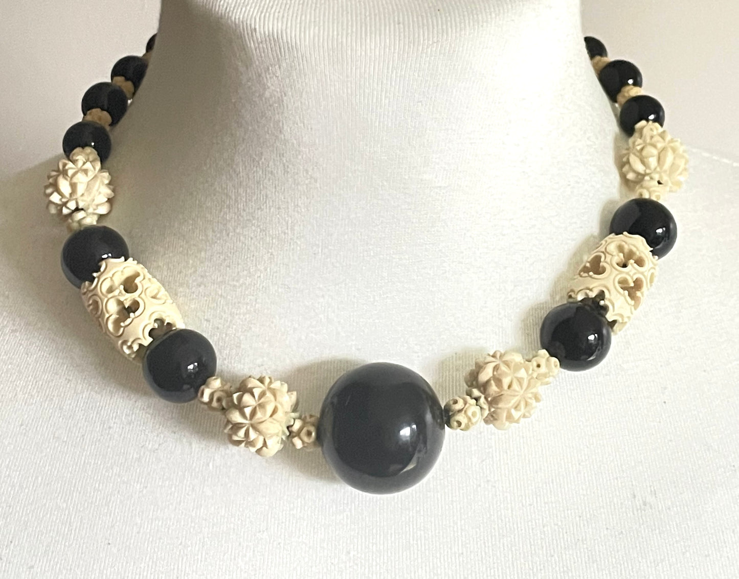 Vintage Louis Rousselet Art Deco carved cream galalith & black glass large bead necklace, beehive clasp 'Made in France', foxtail chain