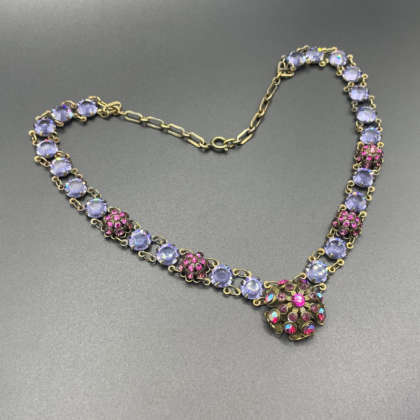 Vintage Art Deco style amethyst purple, pink and violet glass riviere necklace, with bezel set, open backed crystals & rhinestone panels