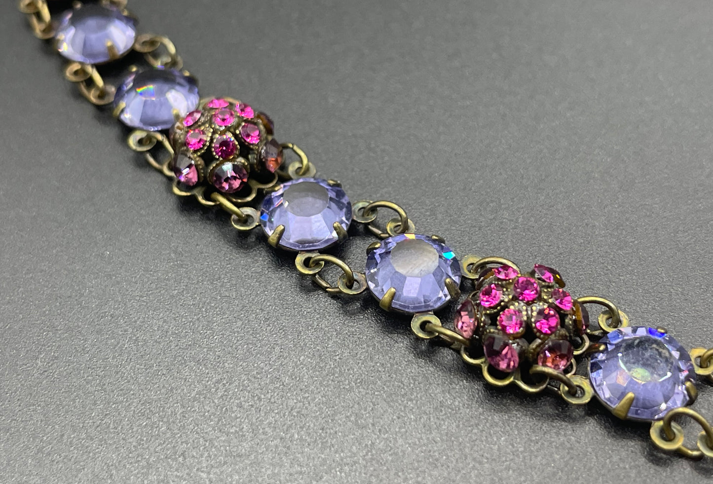 Vintage Art Deco style amethyst purple, pink and violet glass riviere necklace, with bezel set, open backed crystals & rhinestone panels