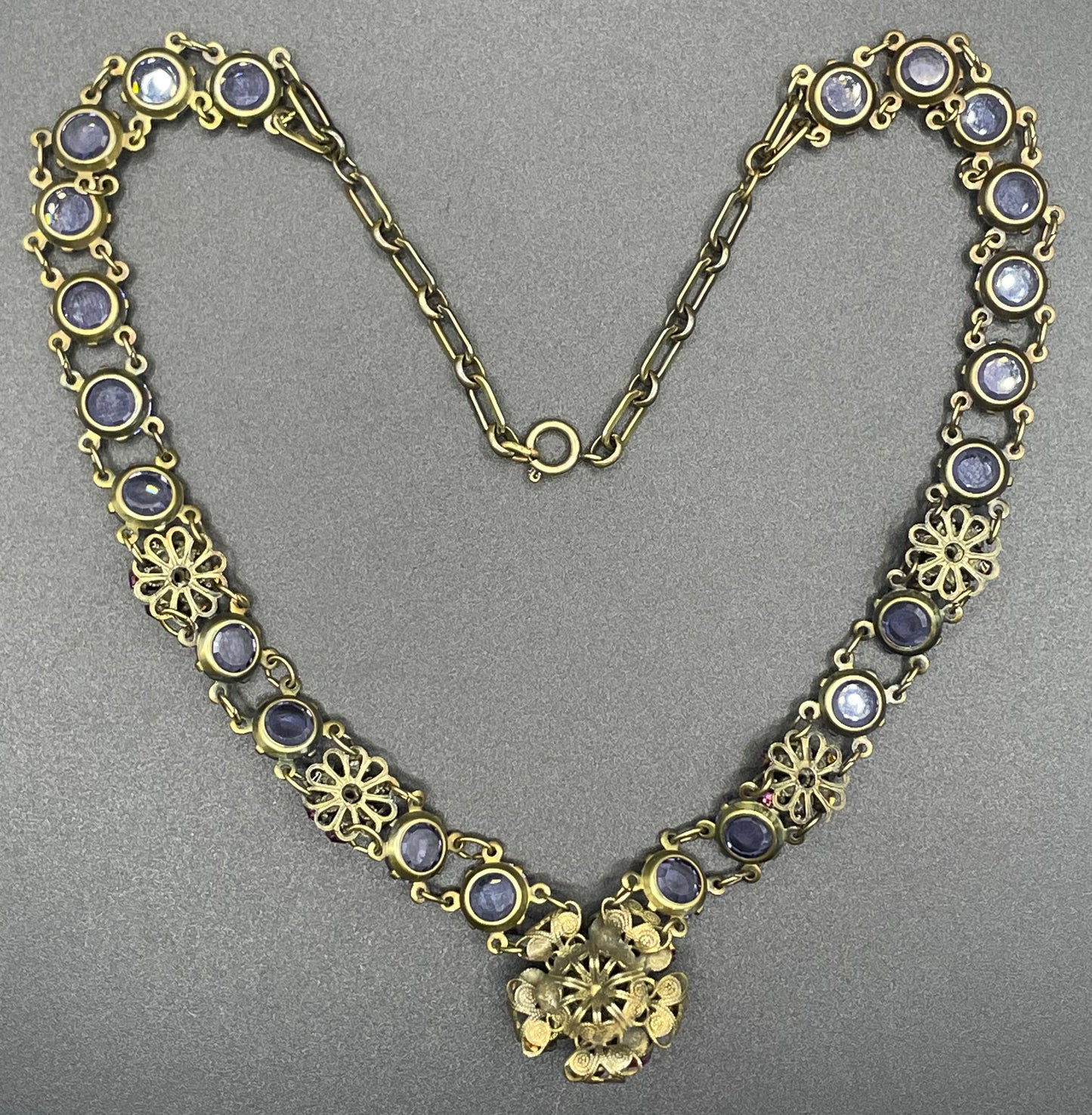 Vintage Art Deco style amethyst purple, pink and violet glass riviere necklace, with bezel set, open backed crystals & rhinestone panels