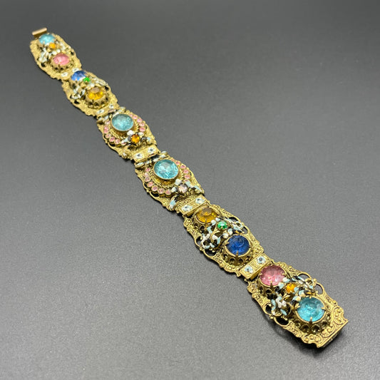 Vintage Art Deco Czech gold tone filigree, multicoloured glass rhinestone and cold painted enamel panel bracelet, possibly Neiger Brothers