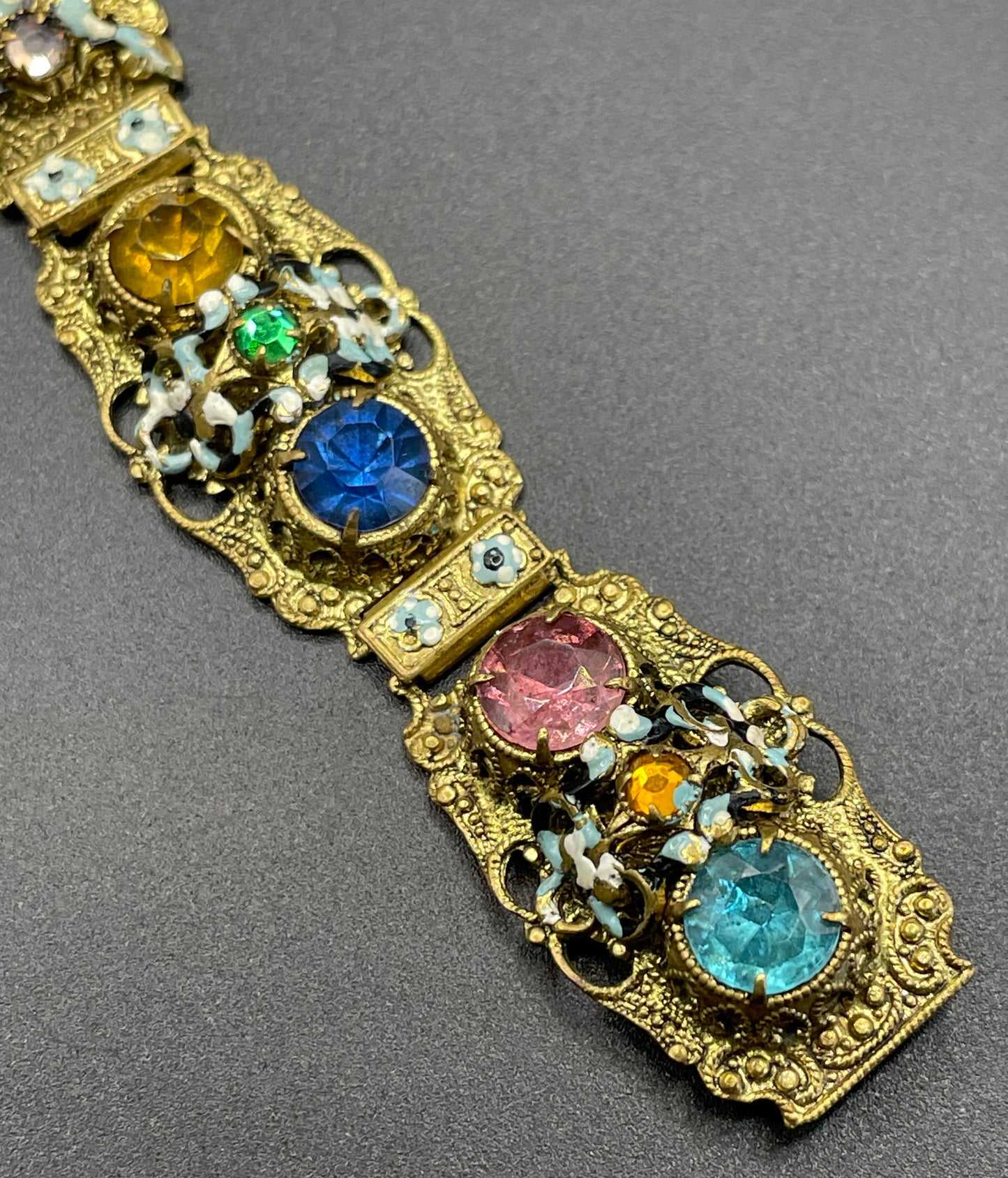 Vintage Art Deco Czech gold tone filigree, multicoloured glass rhinestone and cold painted enamel panel bracelet, possibly Neiger Brothers