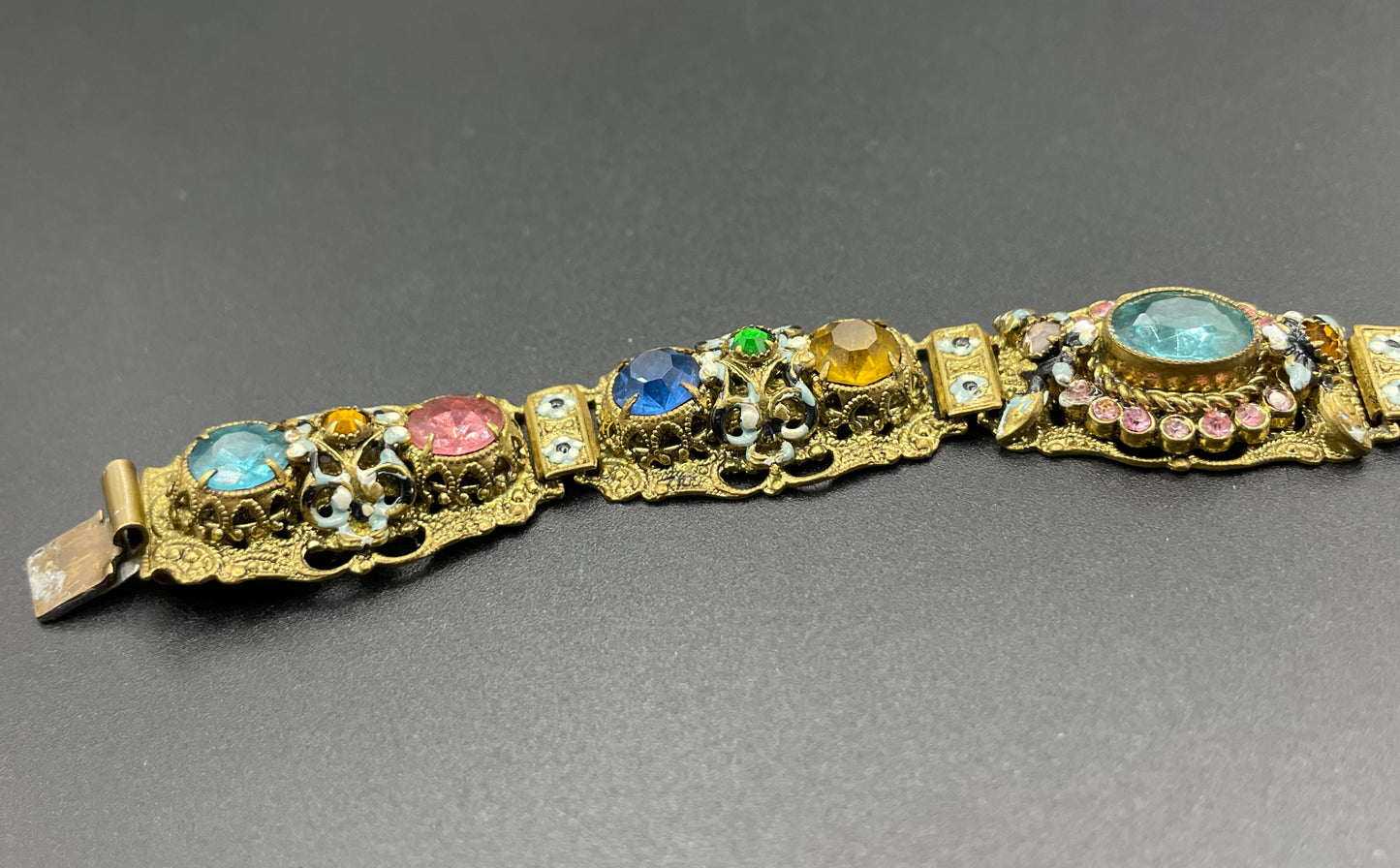 Vintage Art Deco Czech gold tone filigree, multicoloured glass rhinestone and cold painted enamel panel bracelet, possibly Neiger Brothers