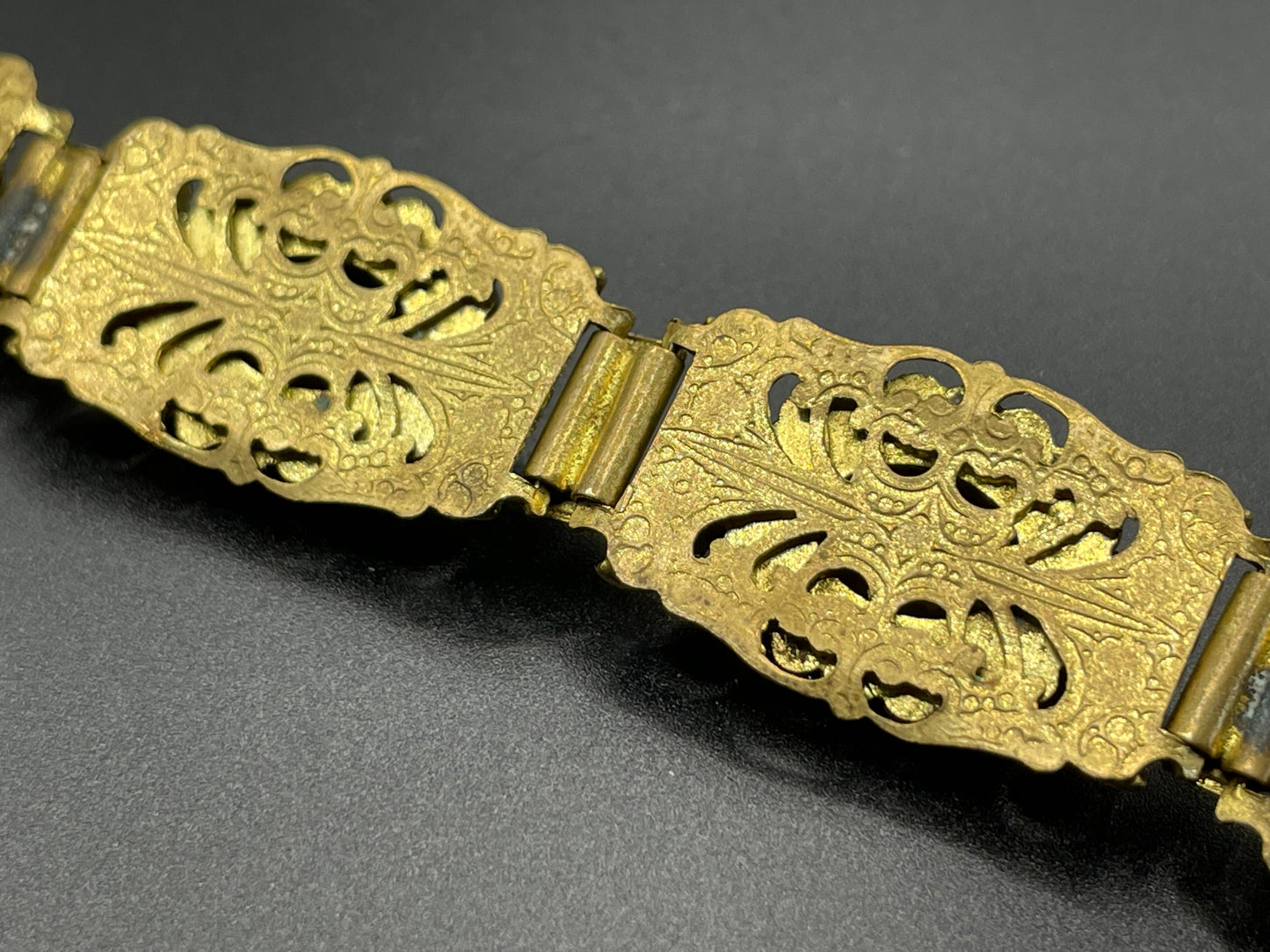 Vintage Art Deco Czech gold tone filigree, multicoloured glass rhinestone and cold painted enamel panel bracelet, possibly Neiger Brothers